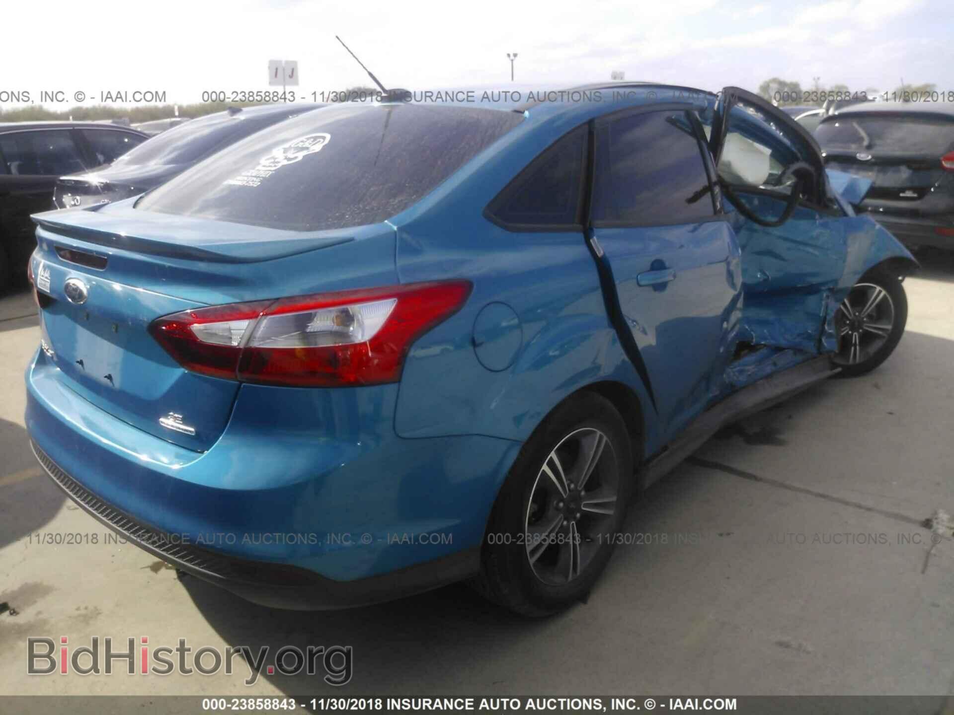 2014 FORD FOCUS - VIN: 1FADP3F20EL311043 - Photo 4