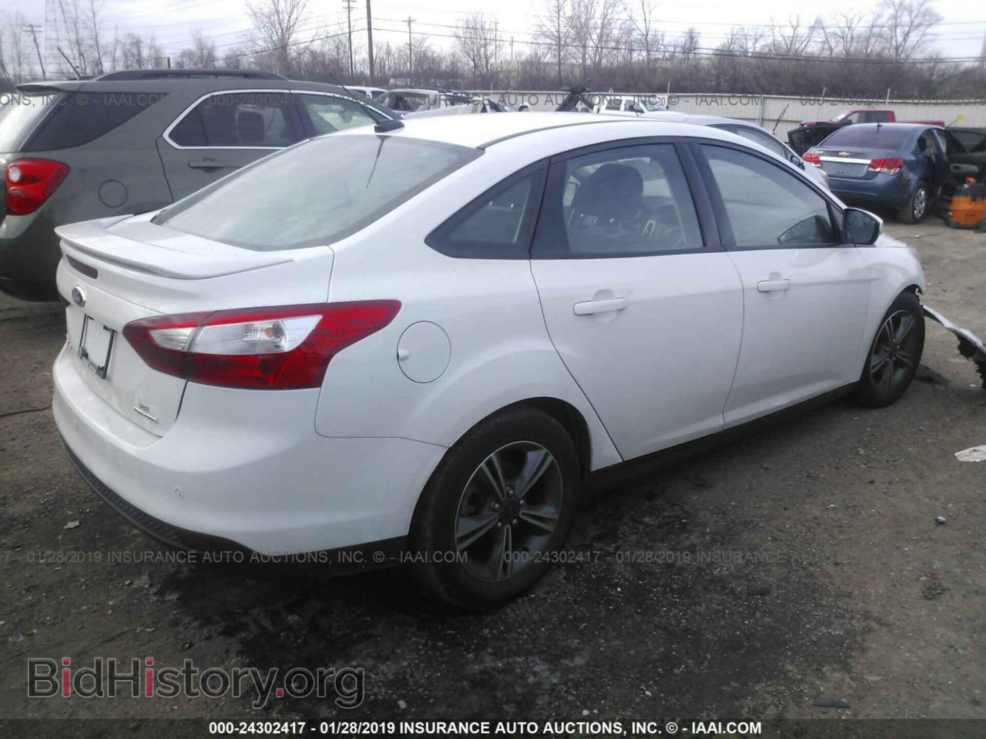 2014 FORD FOCUS - VIN: 1FADP3F2XEL228560 - Photo 4