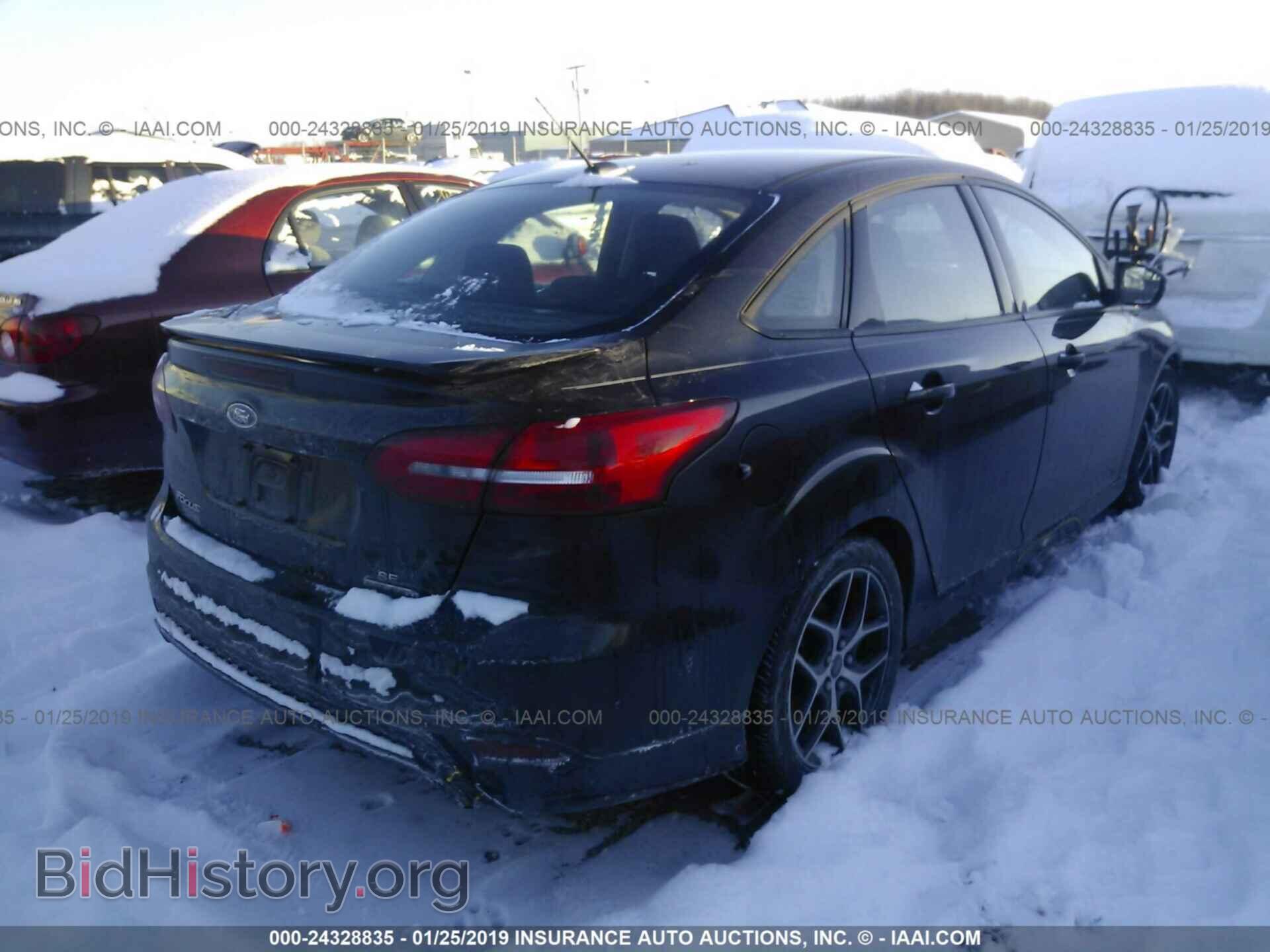 2015 FORD FOCUS - VIN: 1FADP3F2XFL260877 - Photo 4