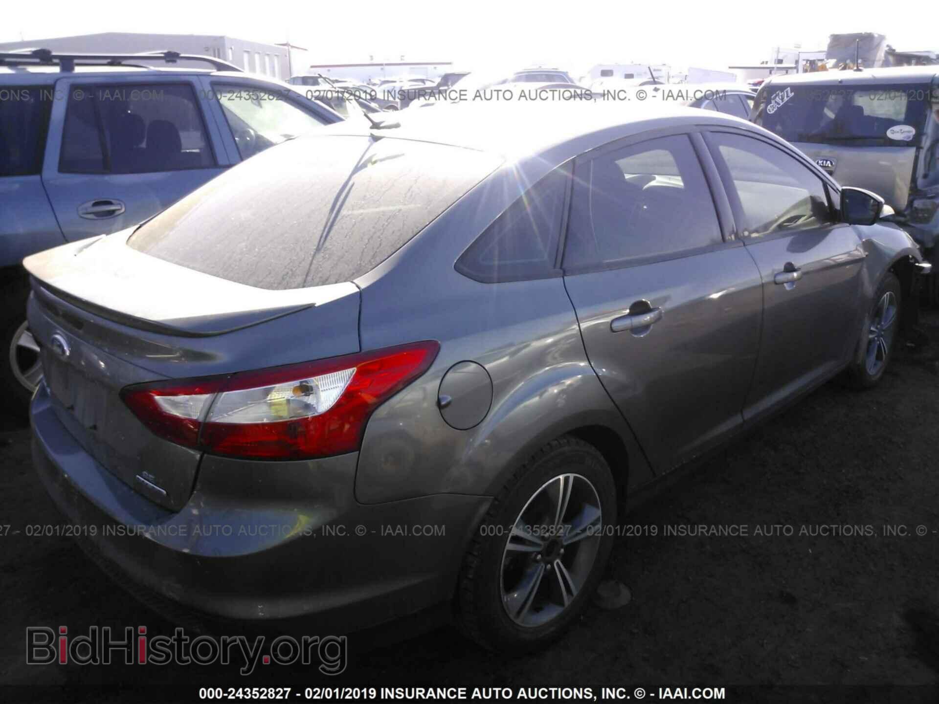 2014 FORD FOCUS - VIN: 1FADP3F28EL197728 - Photo 4