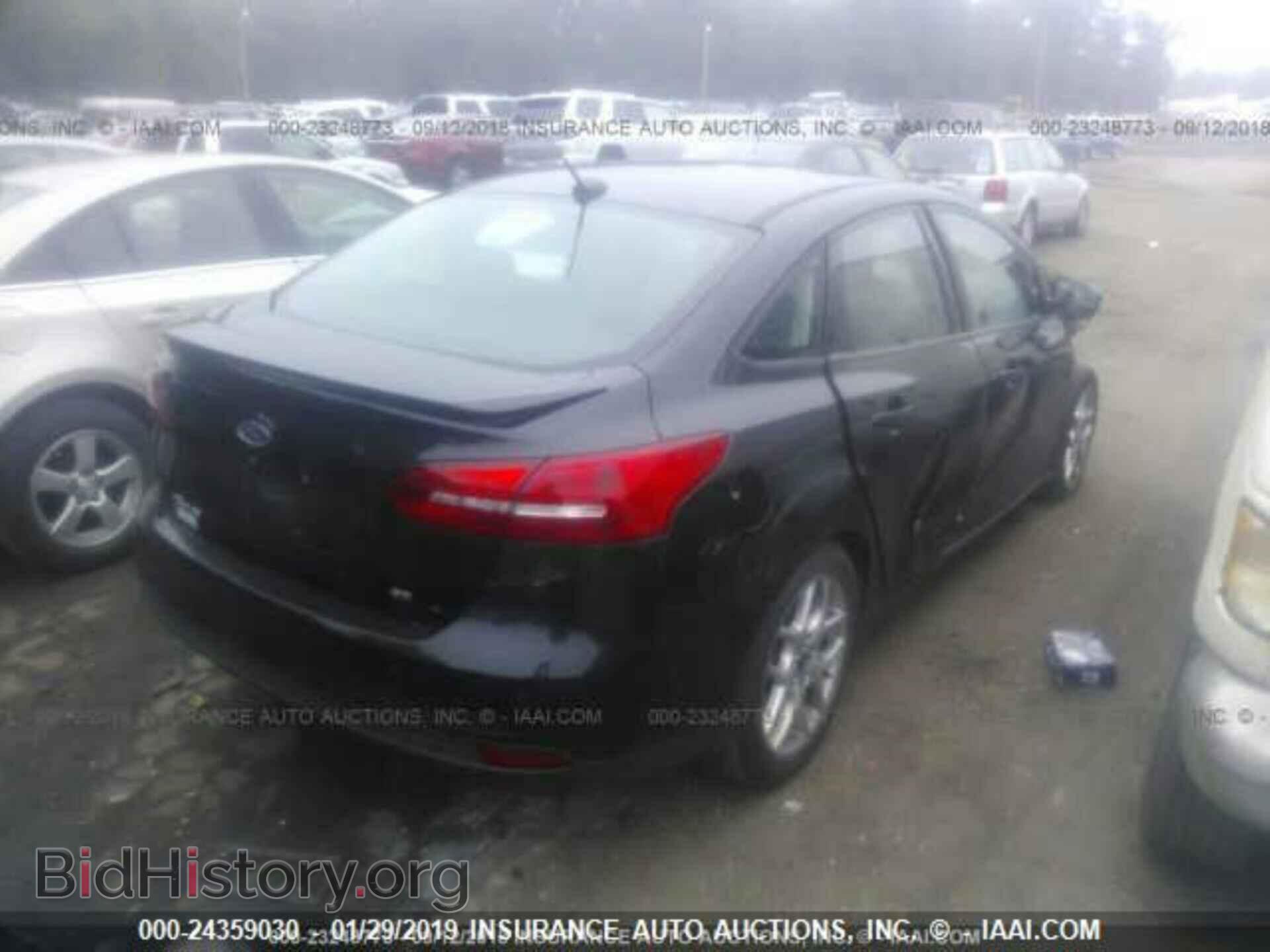 2015 FORD FOCUS - VIN: 1FADP3F20FL292334 - Photo 4