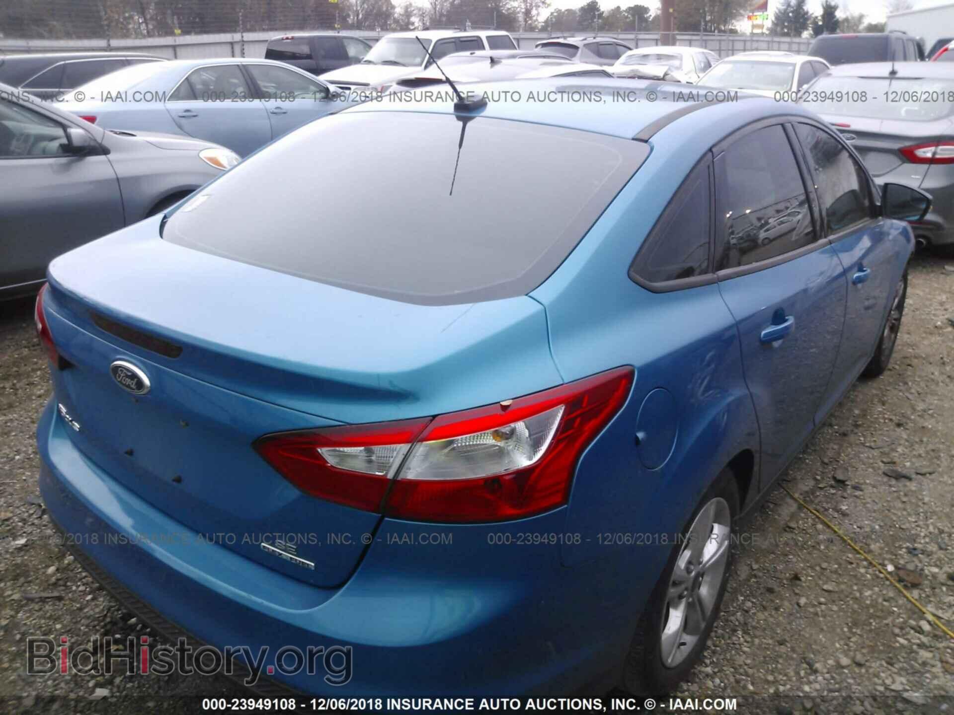 2014 FORD FOCUS - VIN: 1FADP3F2XEL203383 - Photo 4