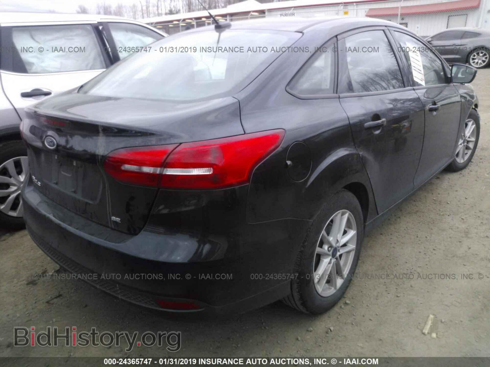 2016 FORD FOCUS - VIN: 1FADP3F24GL282875 - Photo 4
