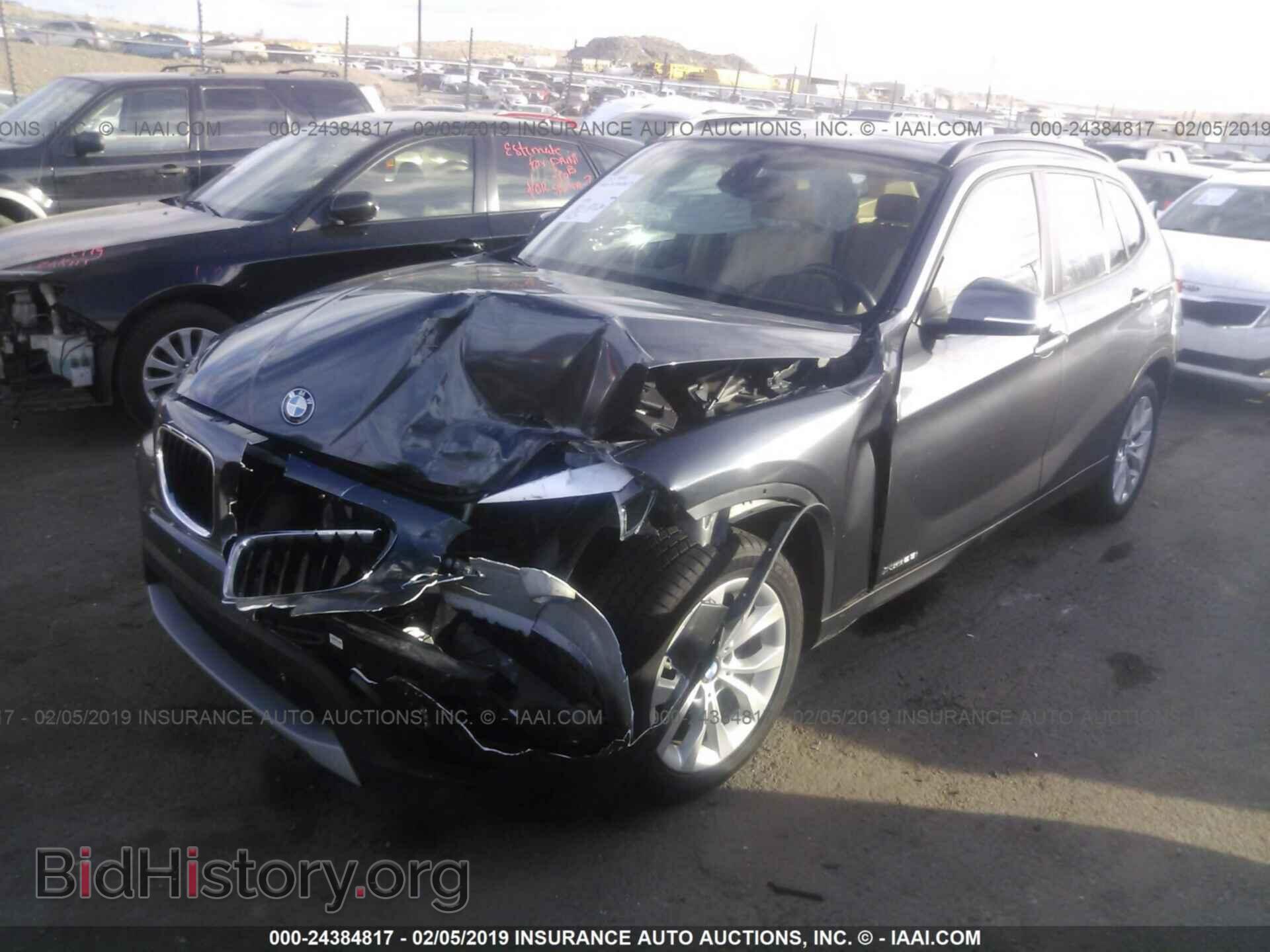 2014 BMW X1 - VIN: WBAVL1C57EVY13305 - Фото 2