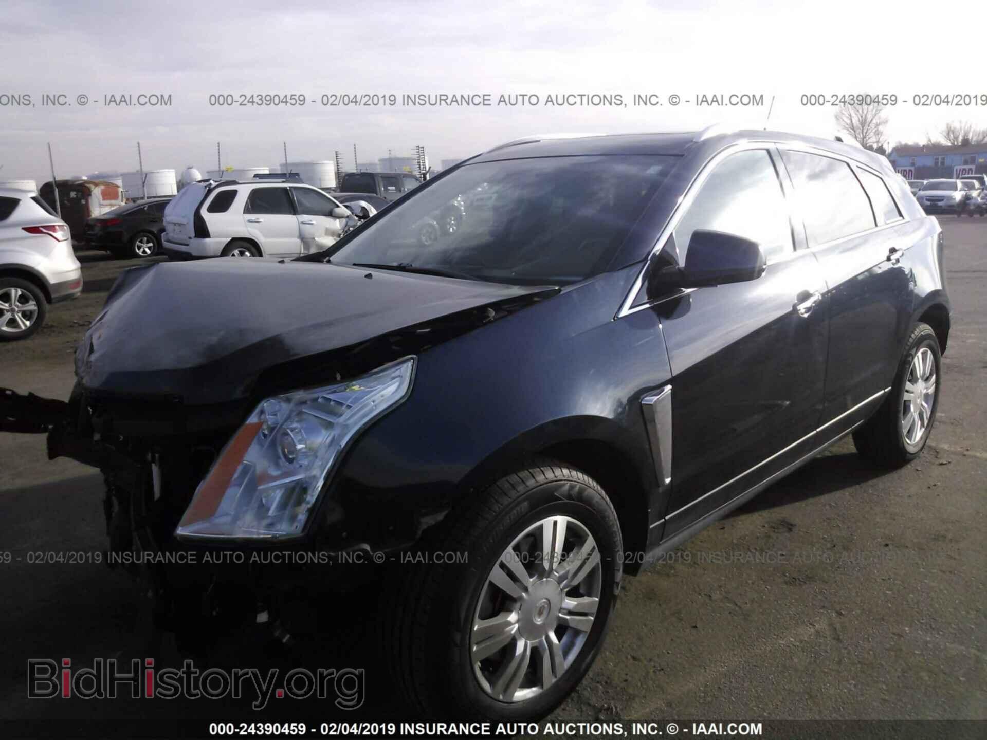 2014 CADILLAC SRX - VIN: 3GYFNEE30ES546626 - Фото 2