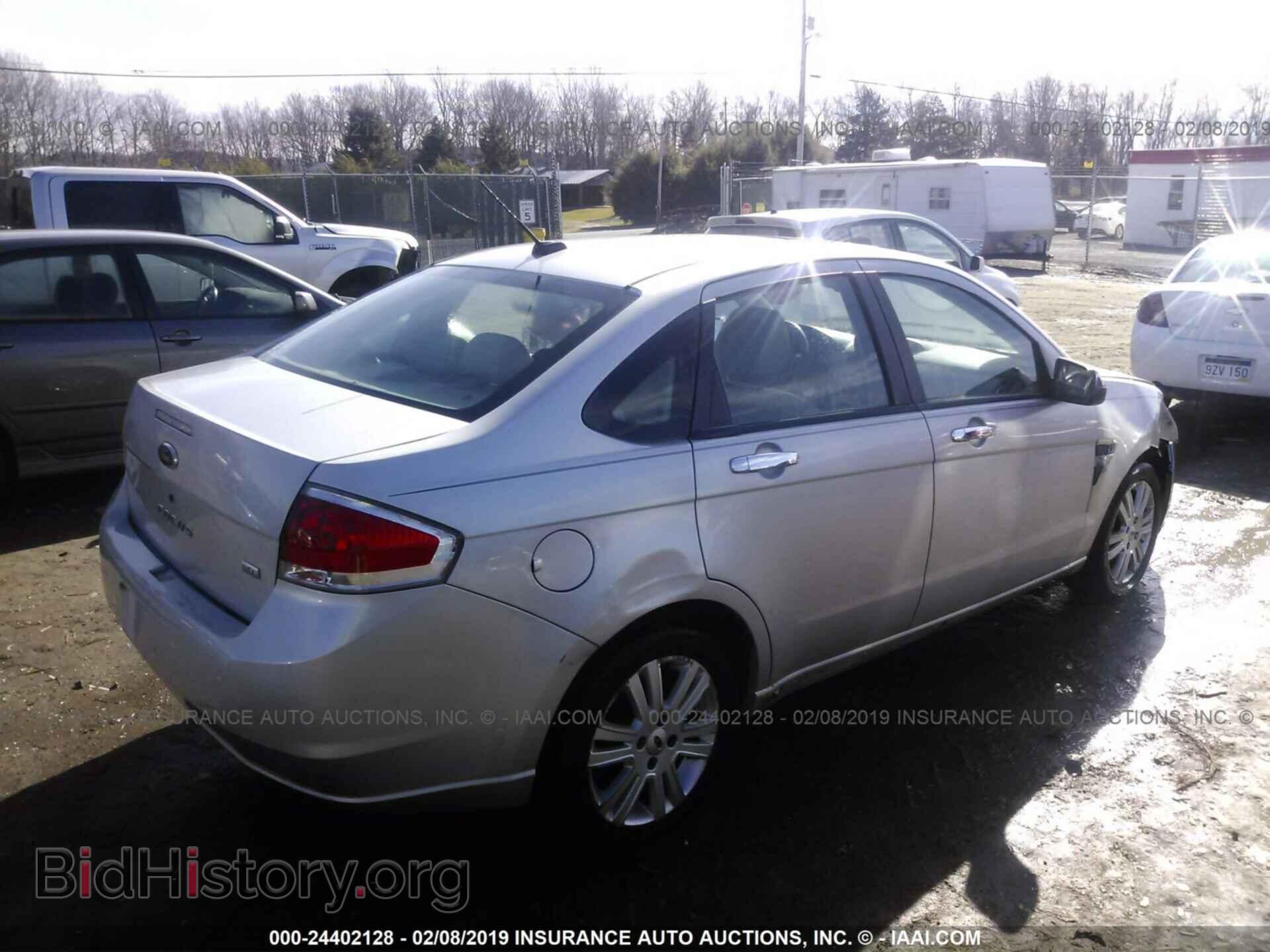 2009 FORD FOCUS - VIN: 1FAHP37N39W232481 - Photo 4