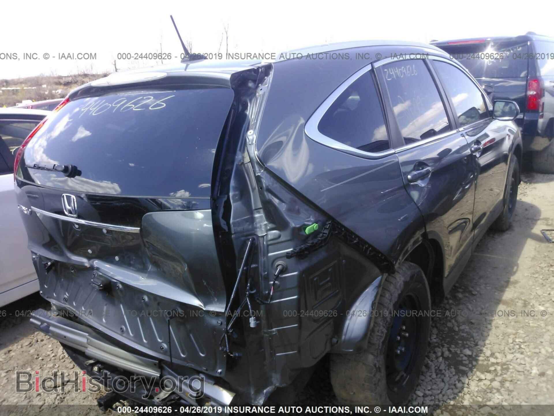 2014 HONDA CR-V - VIN: 2HKRM3H77EH510032 - Фото 4