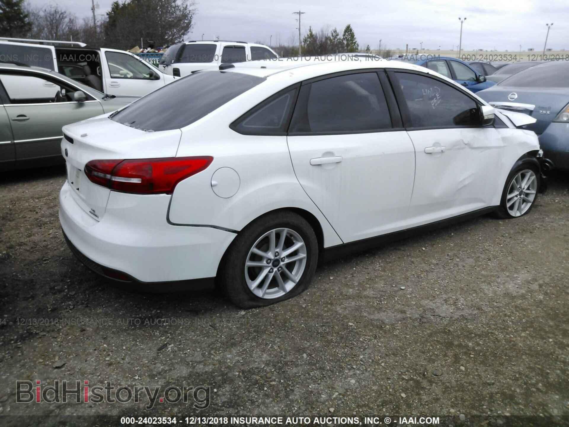 2015 FORD FOCUS - VIN: 1FADP3F27FL214911 - Photo 4