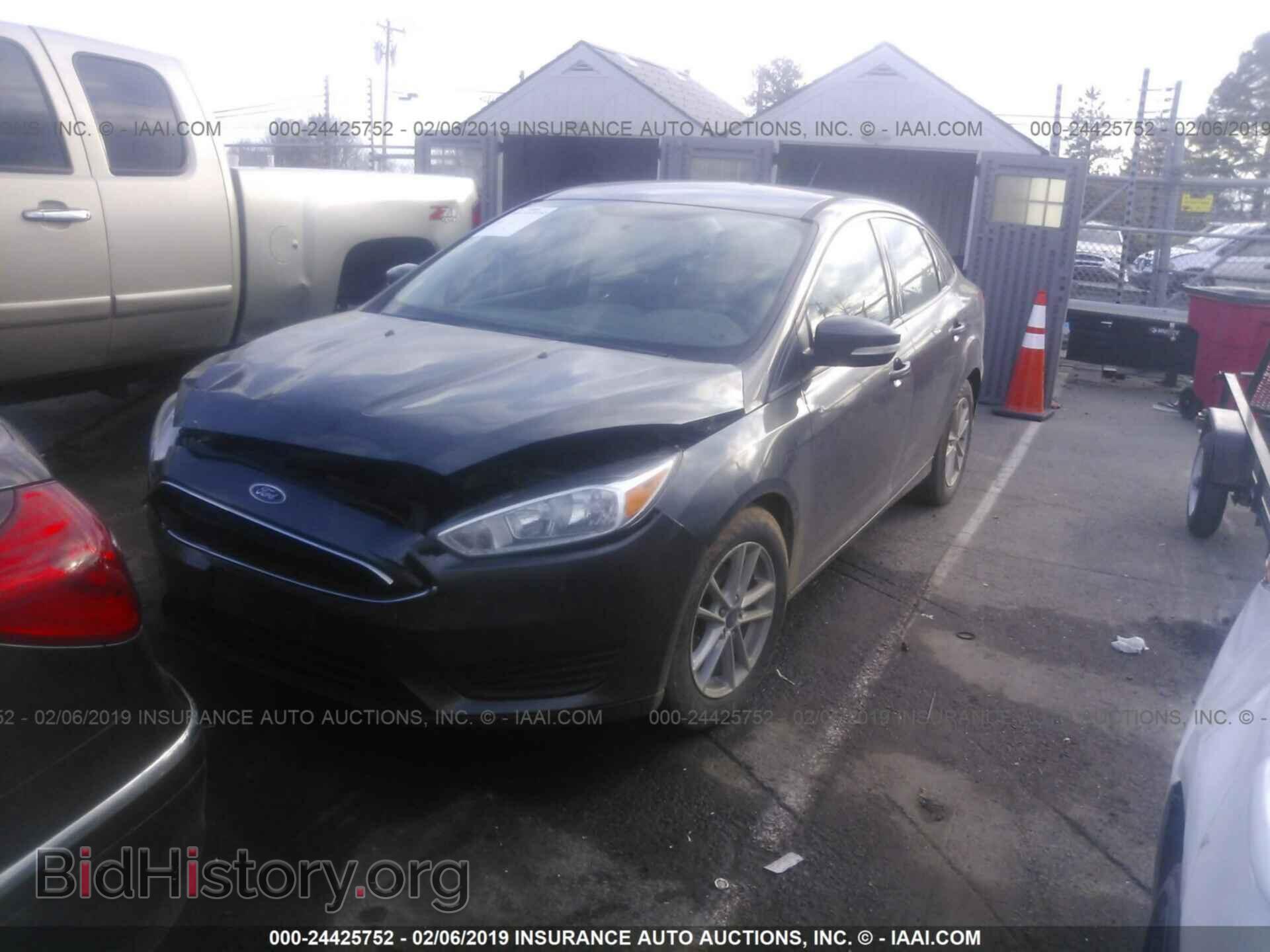 2016 FORD FOCUS - VIN: 1FADP3F20GL371102 - Фото 2