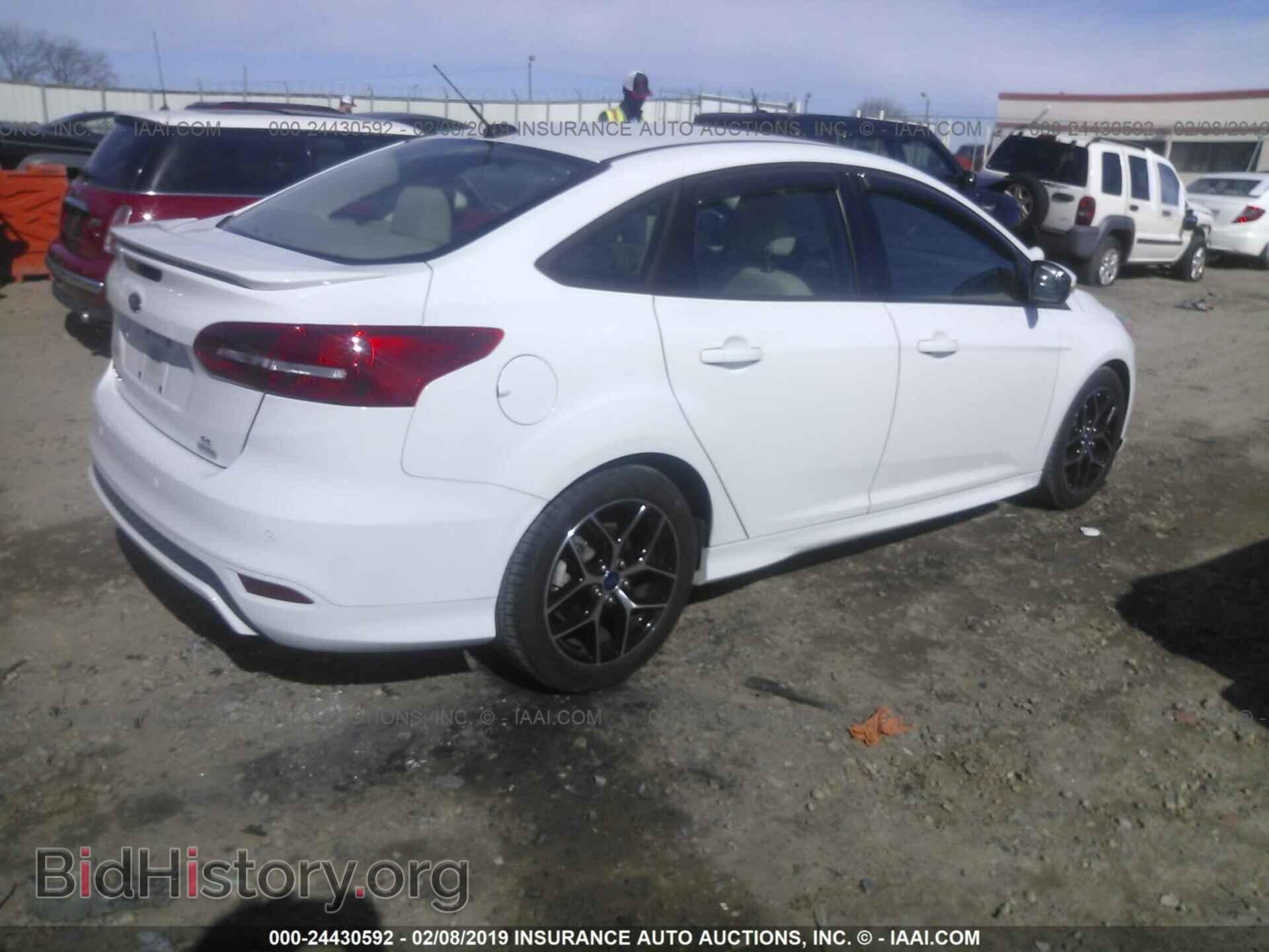 2015 FORD FOCUS - VIN: 1FADP3FE2FL208945 - Photo 4