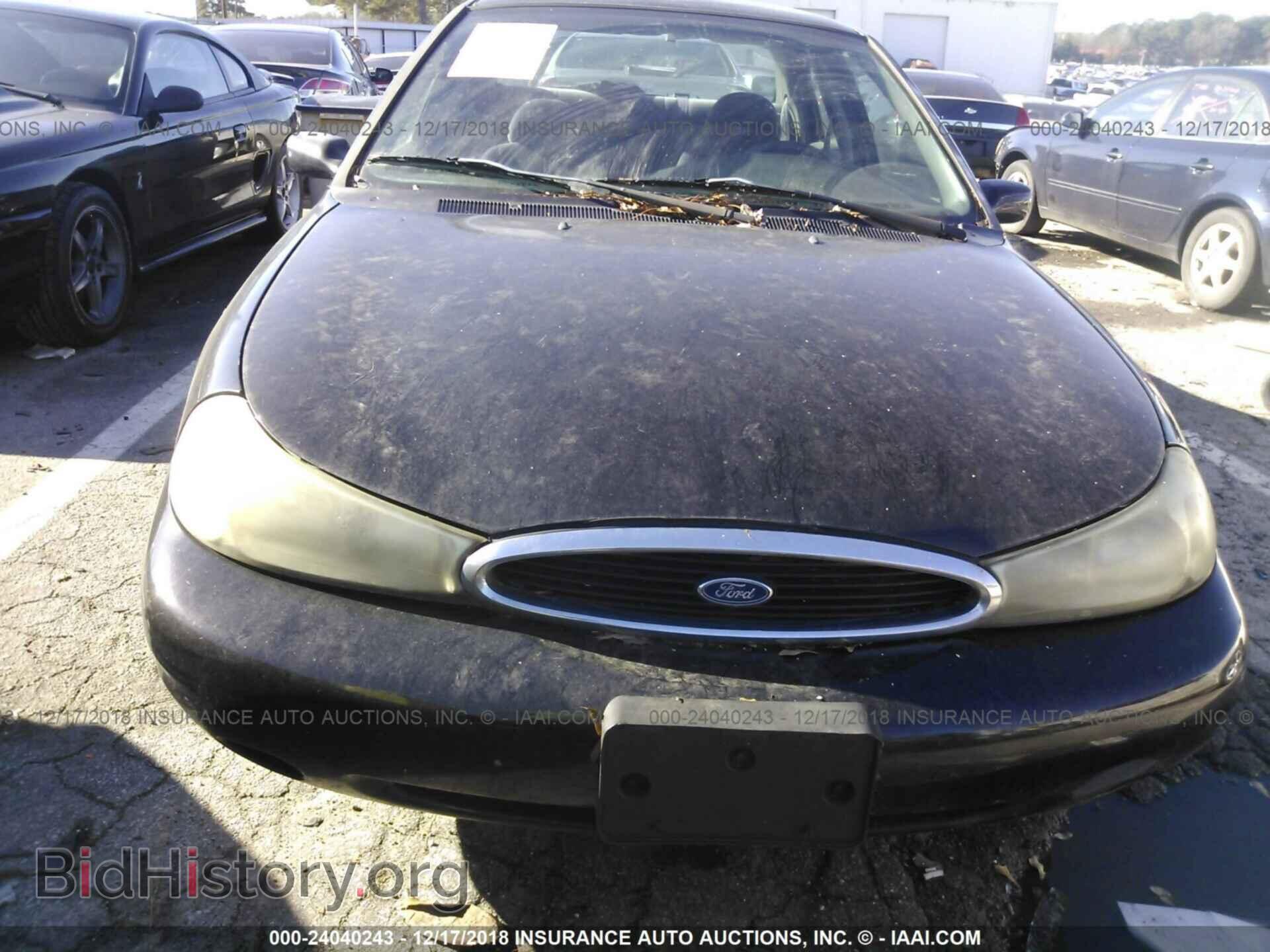 2007 FORD FOCUS - VIN: 1FAFP34N77W302704 - Фото 6