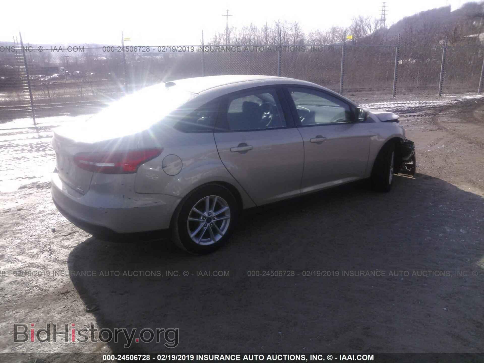 2015 FORD FOCUS - VIN: 1FADP3F20FL383216 - Photo 4