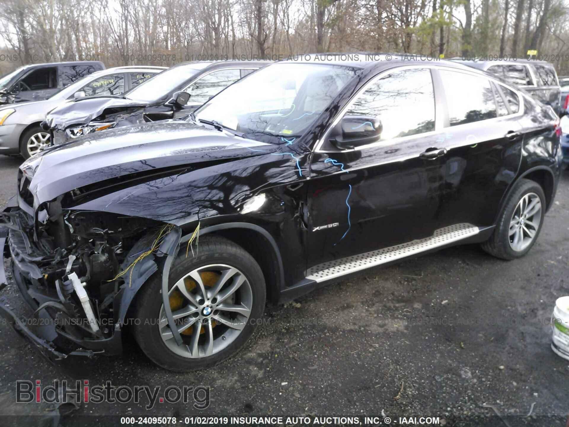 2014 BMW X6 - VIN: 5UXFG8C51EL592590 - Фото 2