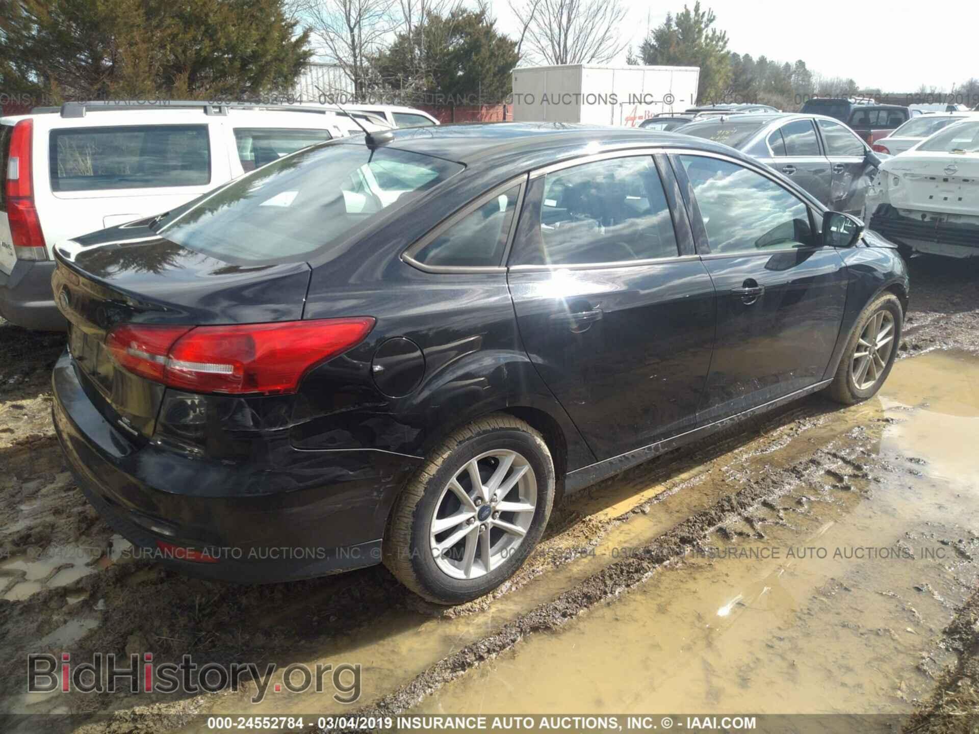 2015 FORD FOCUS - VIN: 1FADP3F21FL202348 - Photo 4