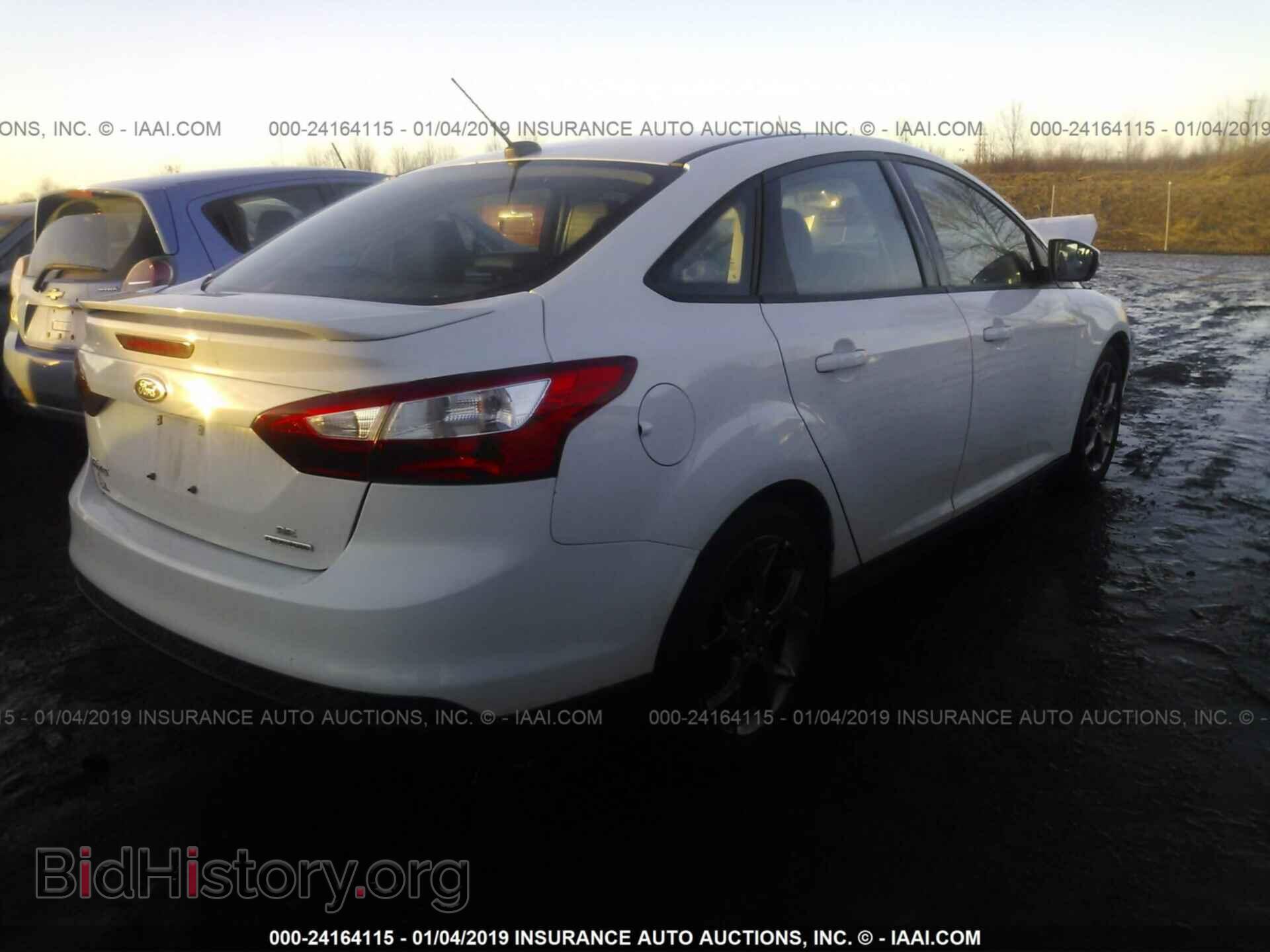 2013 FORD FOCUS - VIN: 1FADP3F21DL302186 - Photo 4