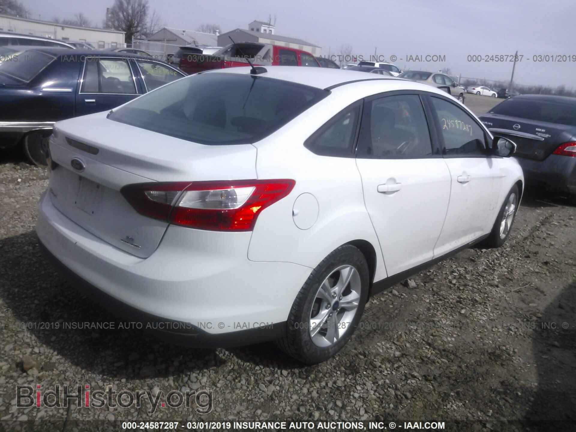 2014 FORD FOCUS - VIN: 1FADP3F28EL404909 - Photo 4