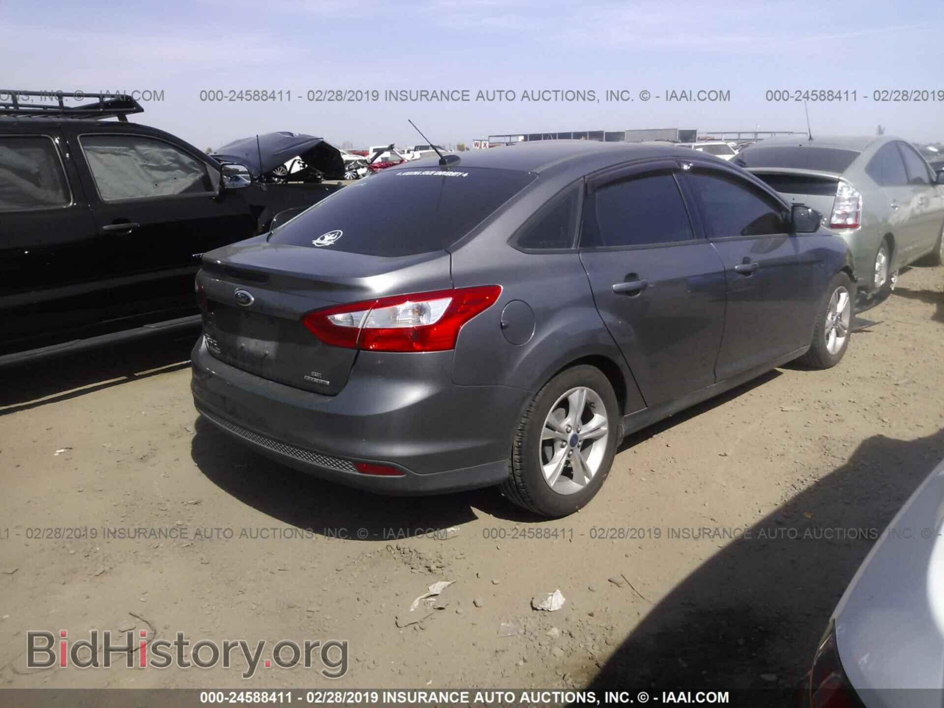 2014 FORD FOCUS - VIN: 1FADP3F2XEL210818 - Photo 4