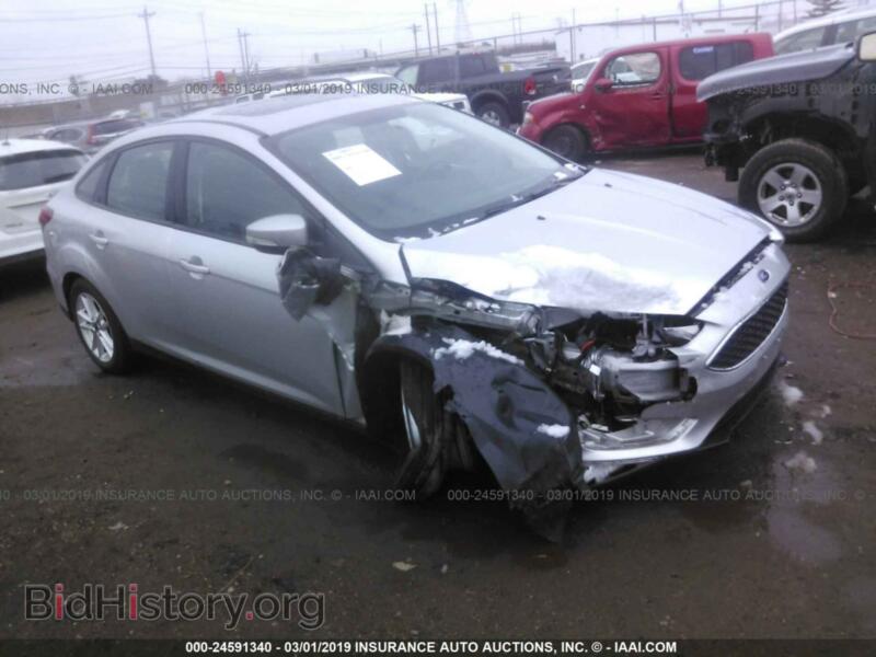 2016 Ford FOCUS SE (VIN 1FADP3F27GL314458) — фото 1 из 10, IAAI, повреждение: правый бок