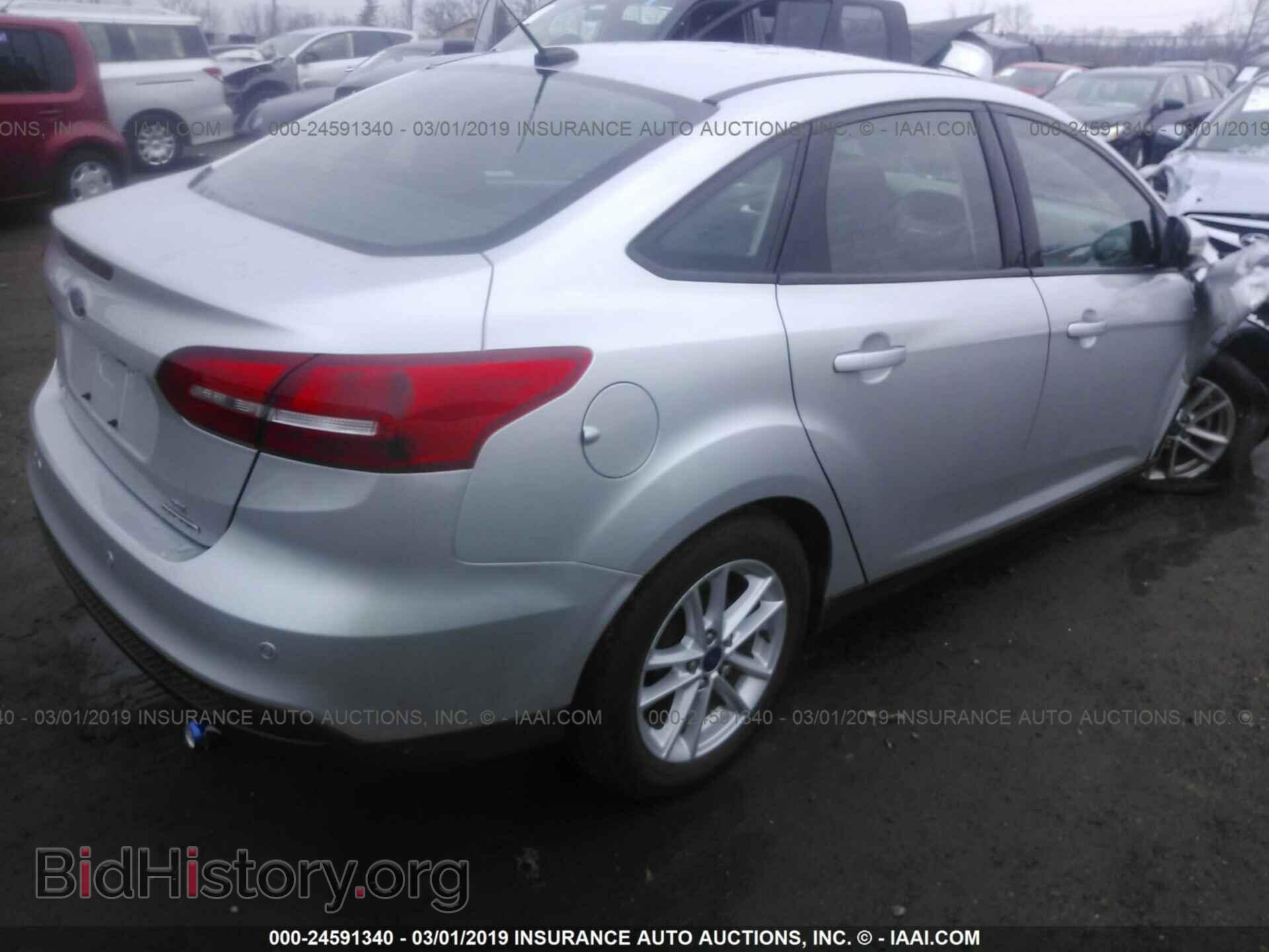 2016 FORD FOCUS - VIN: 1FADP3F27GL314458 - Photo 4
