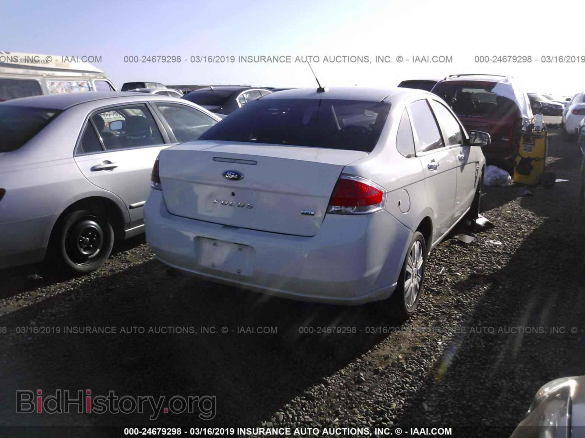 2009 FORD FOCUS - VIN: 1FAHP37N99W196991 - Фото 4