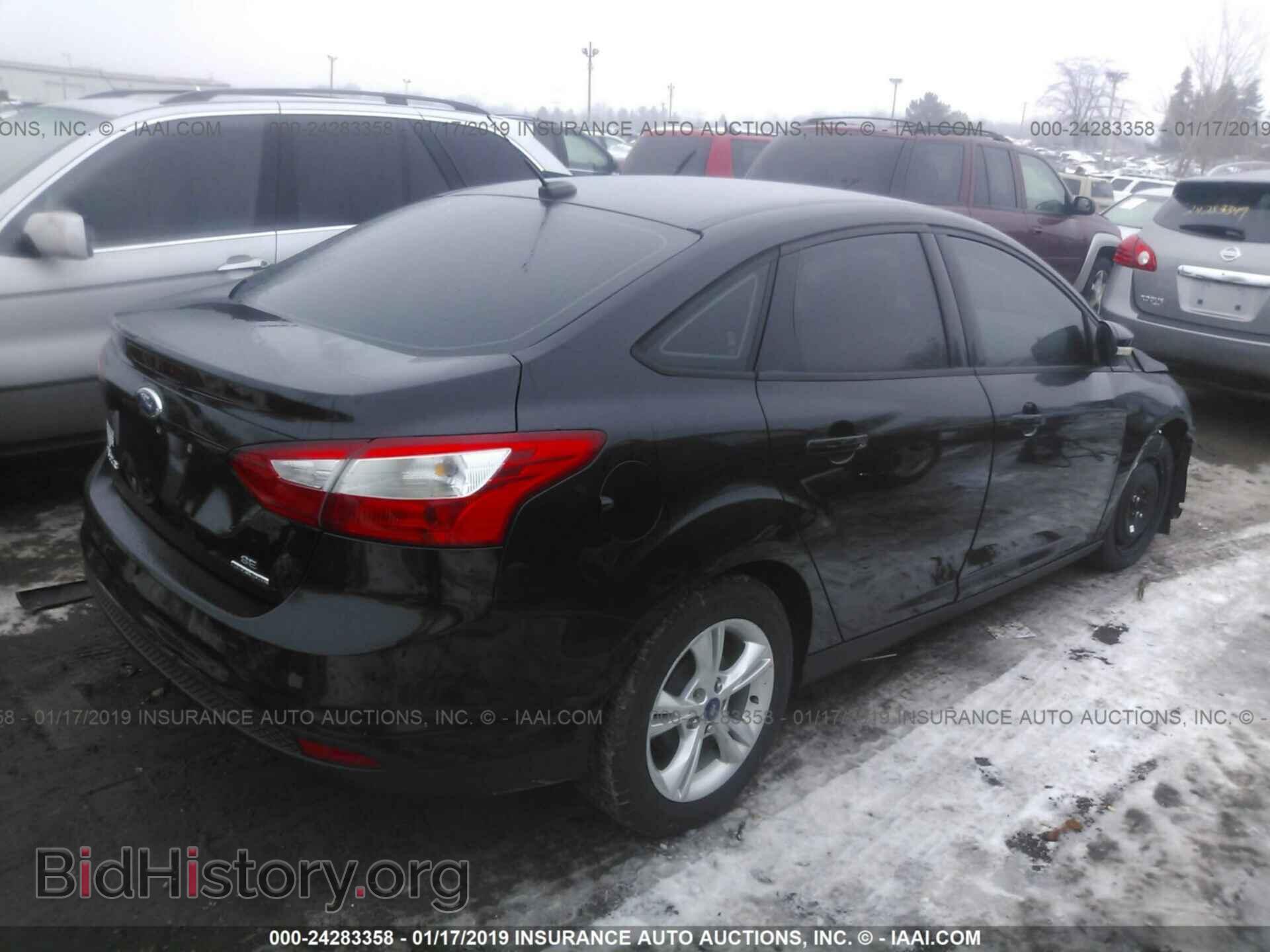 2014 FORD FOCUS - VIN: 1FADP3F21EL105424 - Photo 4