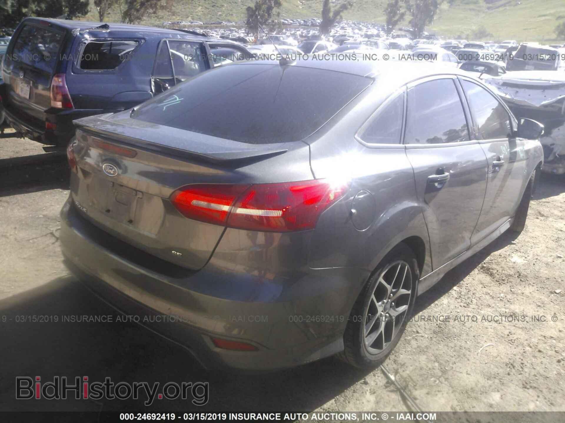 2015 FORD FOCUS - VIN: 1FADP3F24FL248997 - Photo 4