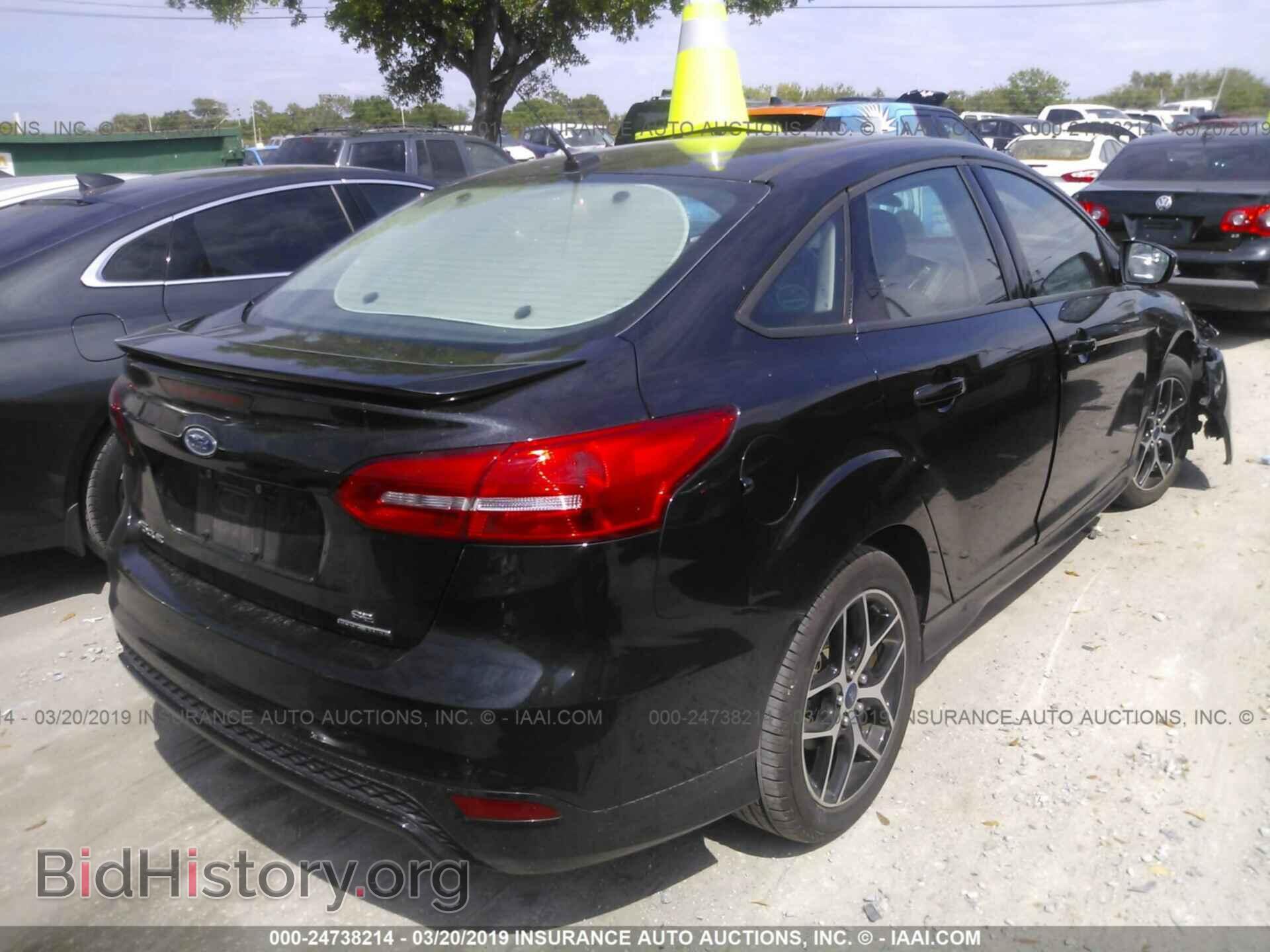 2015 FORD FOCUS - VIN: 1FADP3F20FL384009 - Photo 4