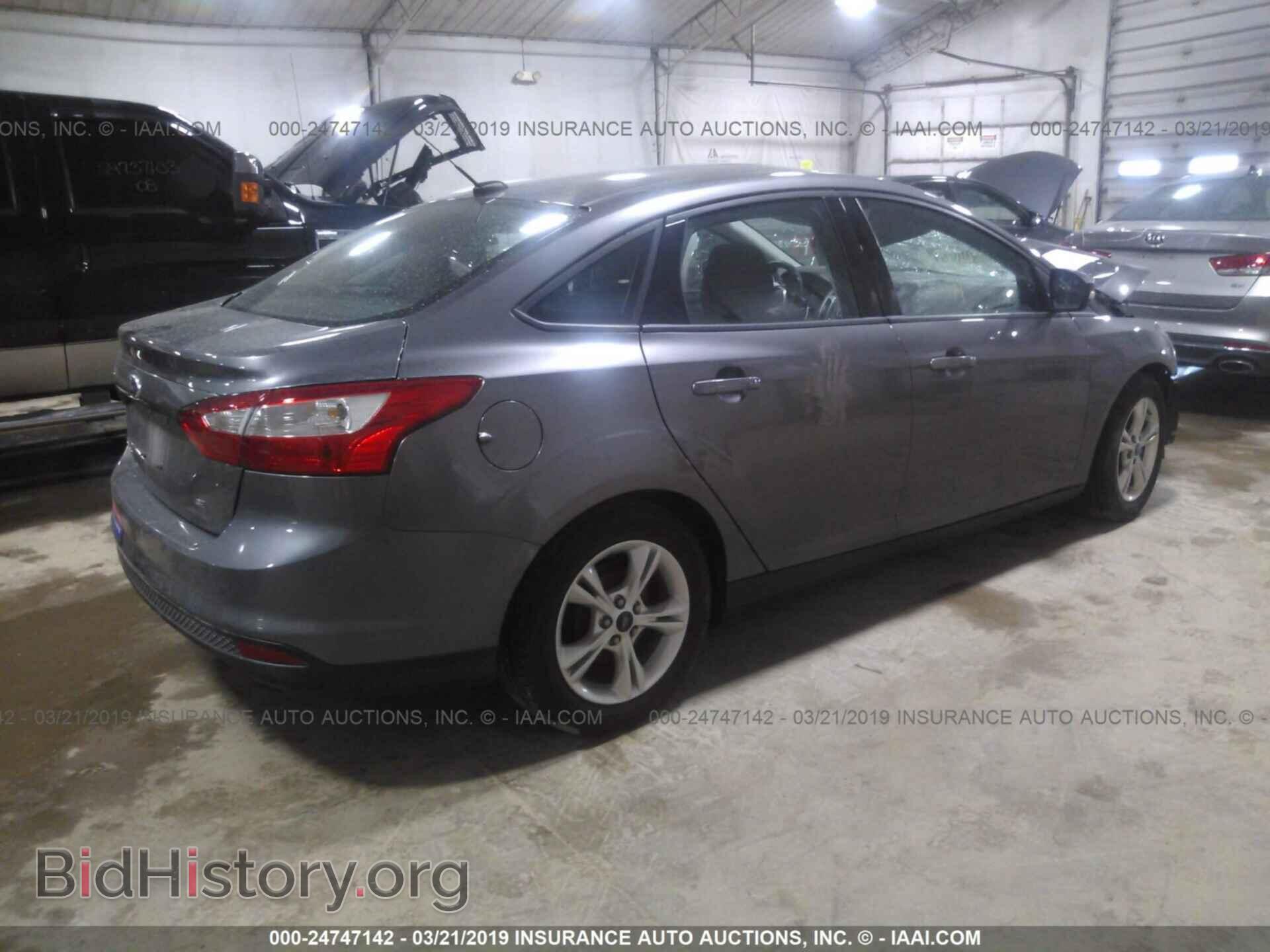 2014 FORD FOCUS - VIN: 1FADP3F21EL424936 - Photo 4
