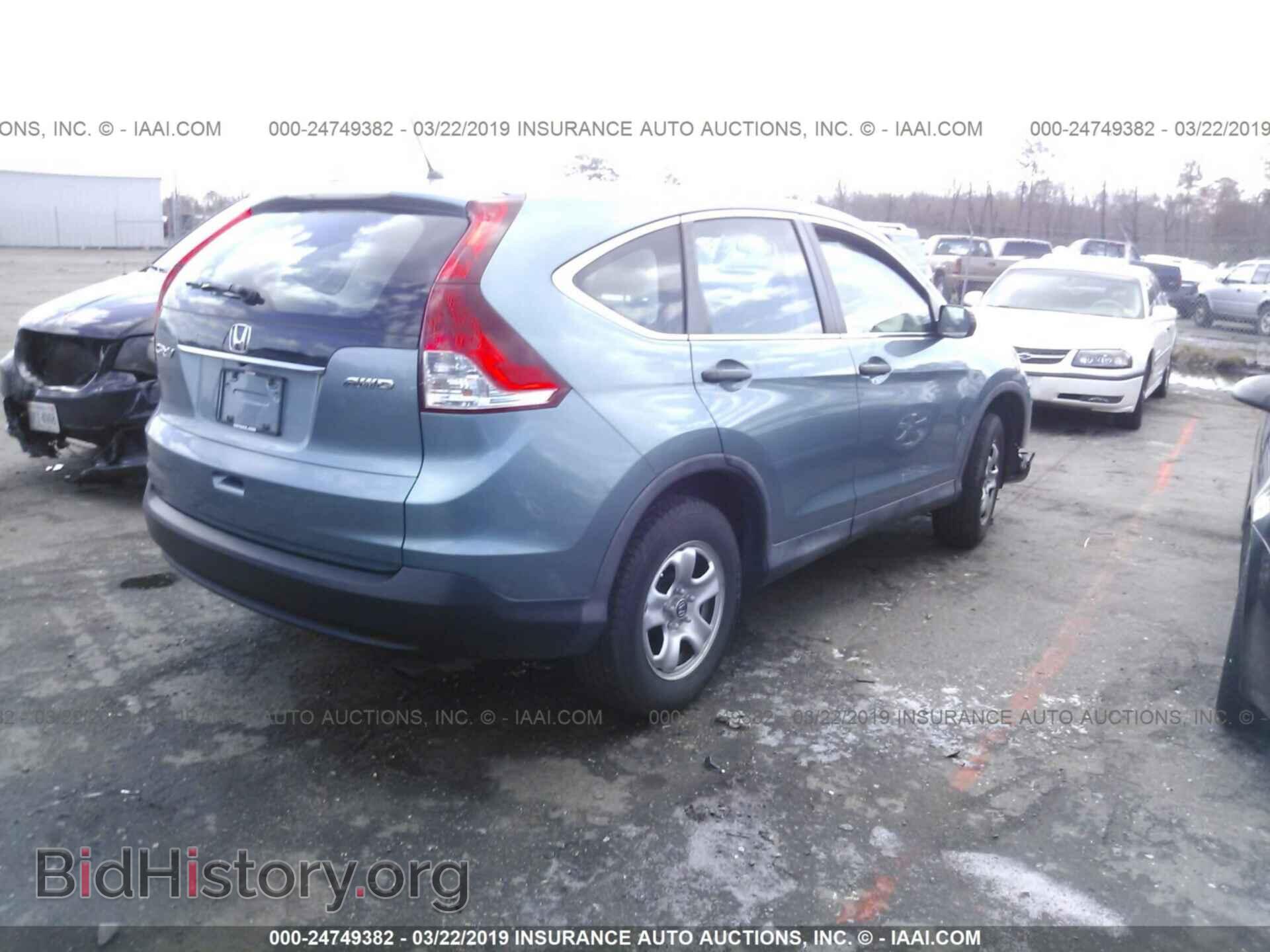 2014 HONDA CR-V - VIN: 2HKRM4H38EH679883 - Фото 4
