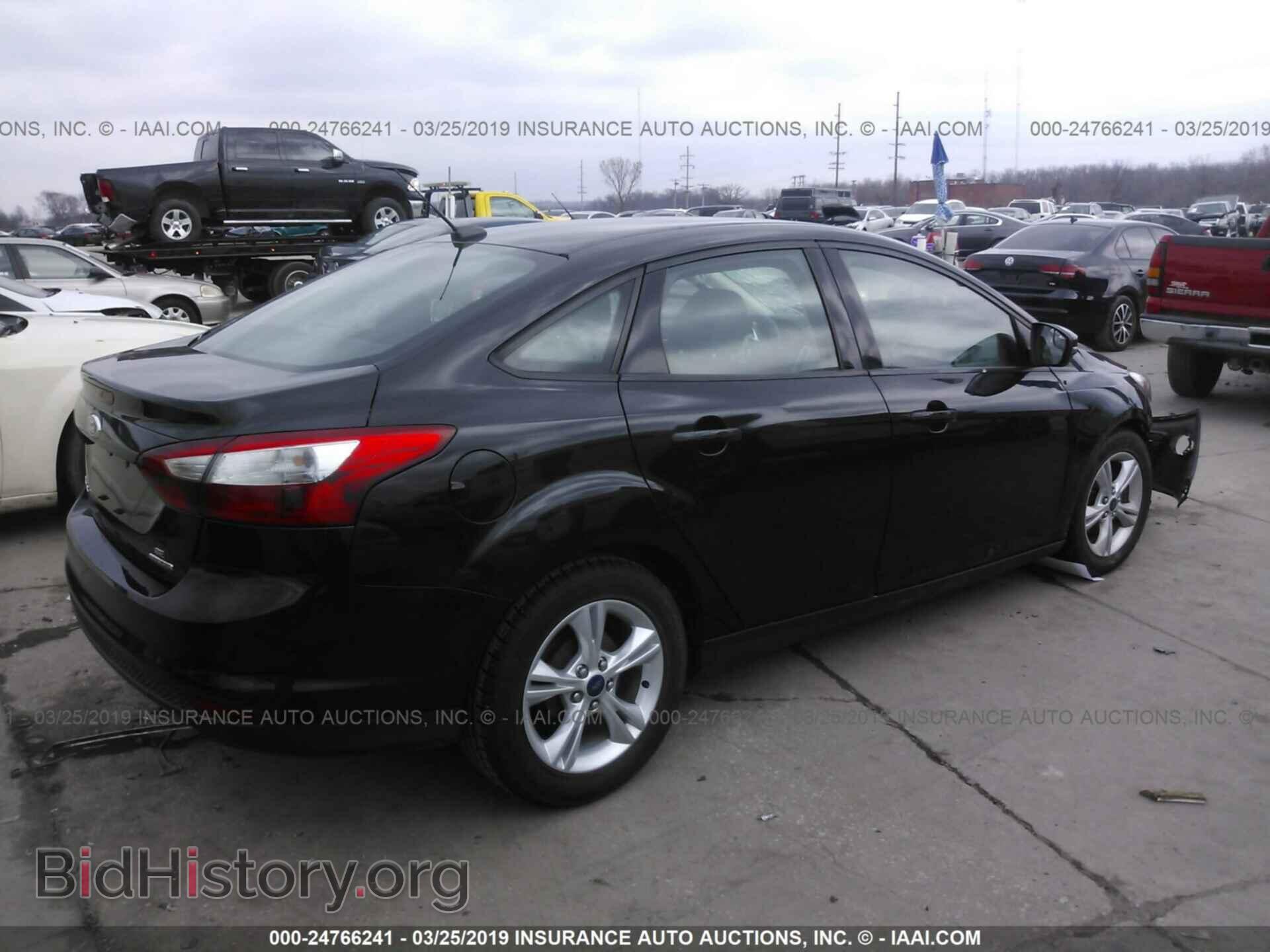 2014 FORD FOCUS - VIN: 1FADP3F2XEL362789 - Photo 4