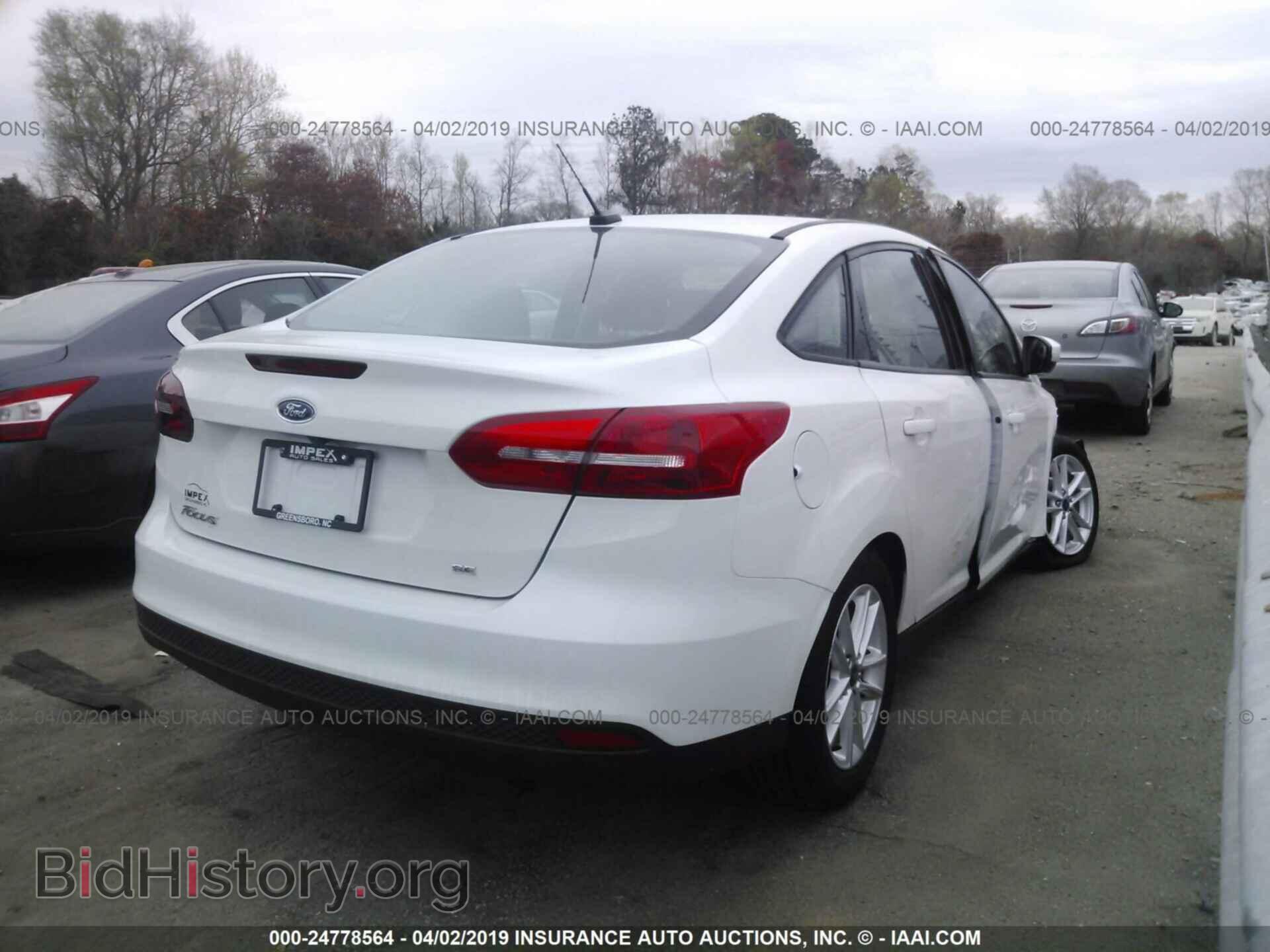 2017 FORD FOCUS - VIN: 1FADP3F21HL208234 - Photo 4