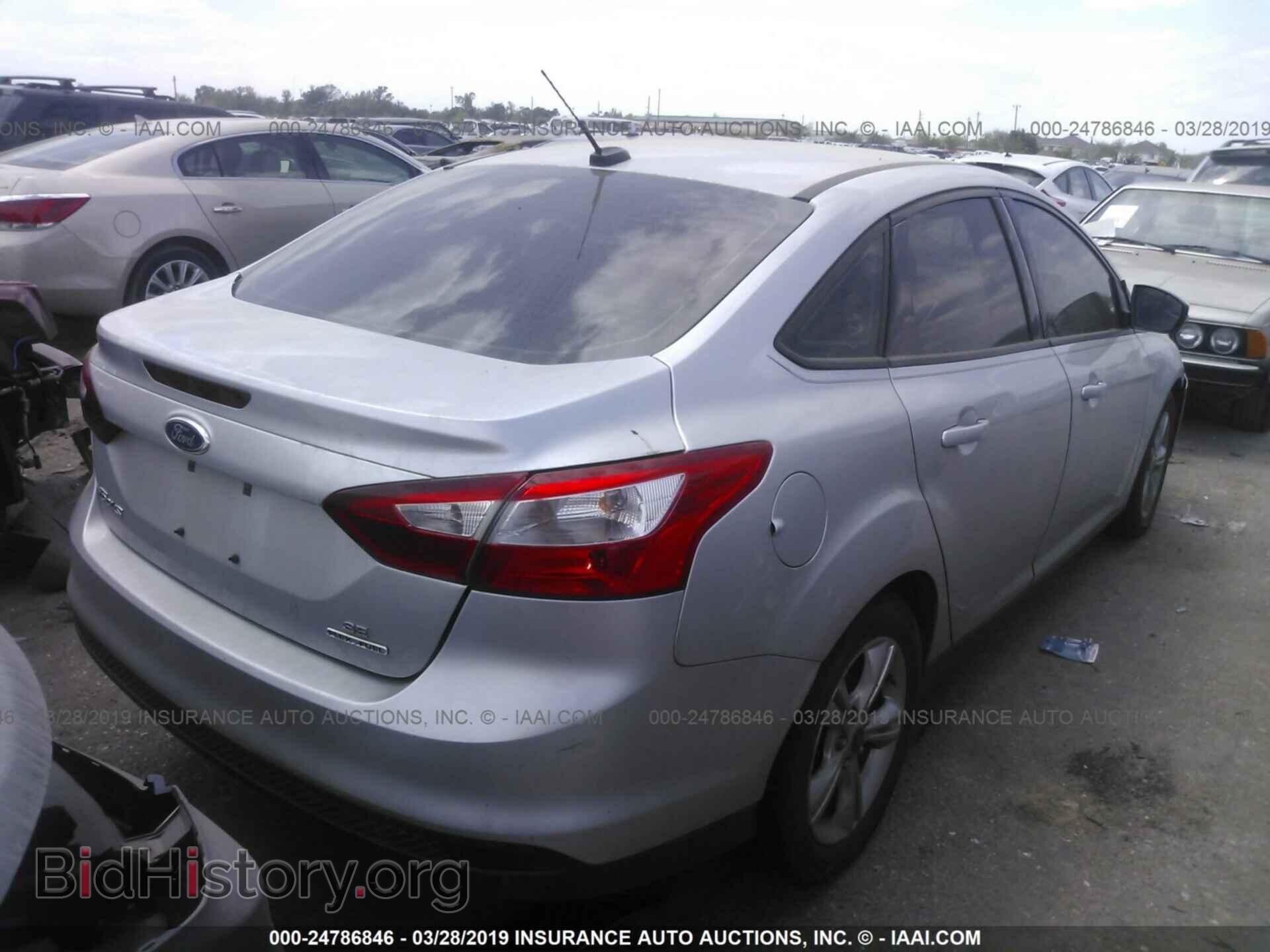 2014 FORD FOCUS - VIN: 1FADP3F27EL387360 - Photo 4