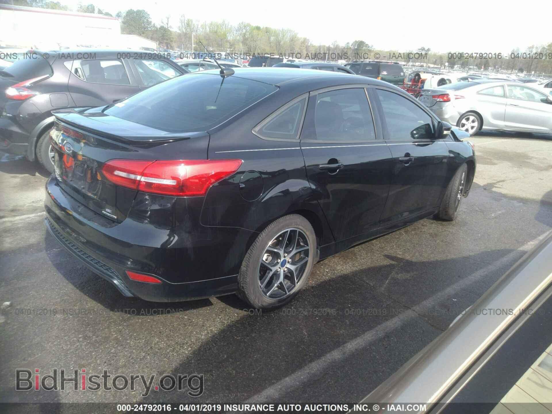 2016 FORD FOCUS - VIN: 1FADP3F22GL210704 - Photo 4