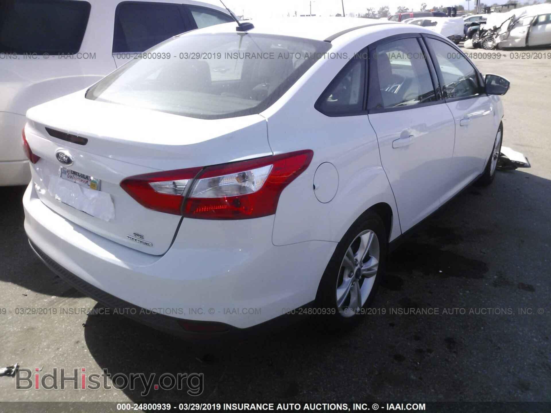 2014 FORD FOCUS - VIN: 1FADP3F20EL211721 - Photo 4