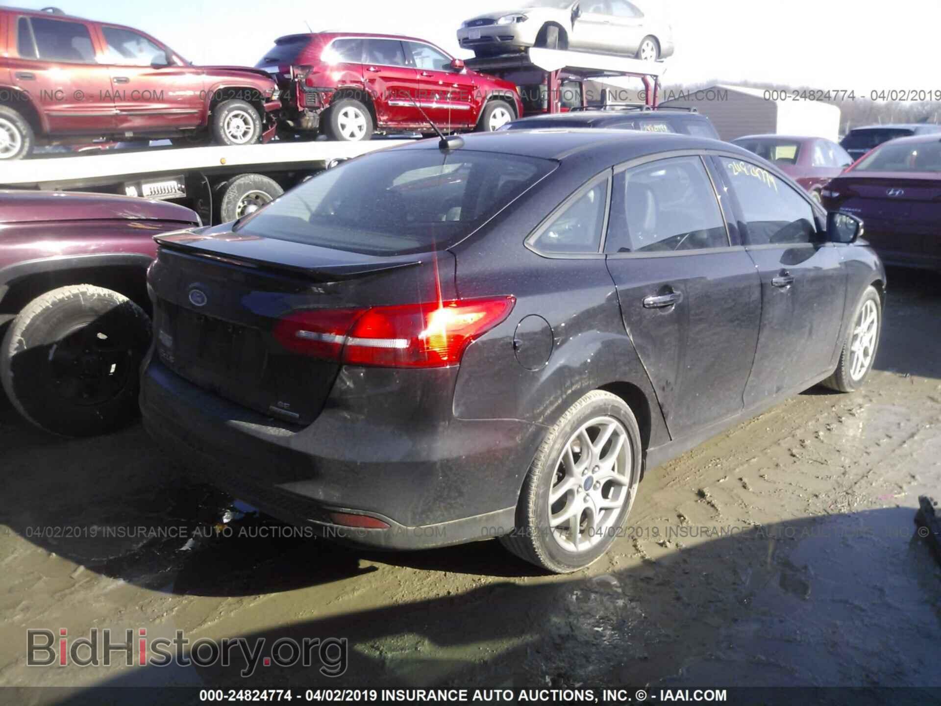 2015 FORD FOCUS - VIN: 1FADP3F21FL360849 - Photo 4