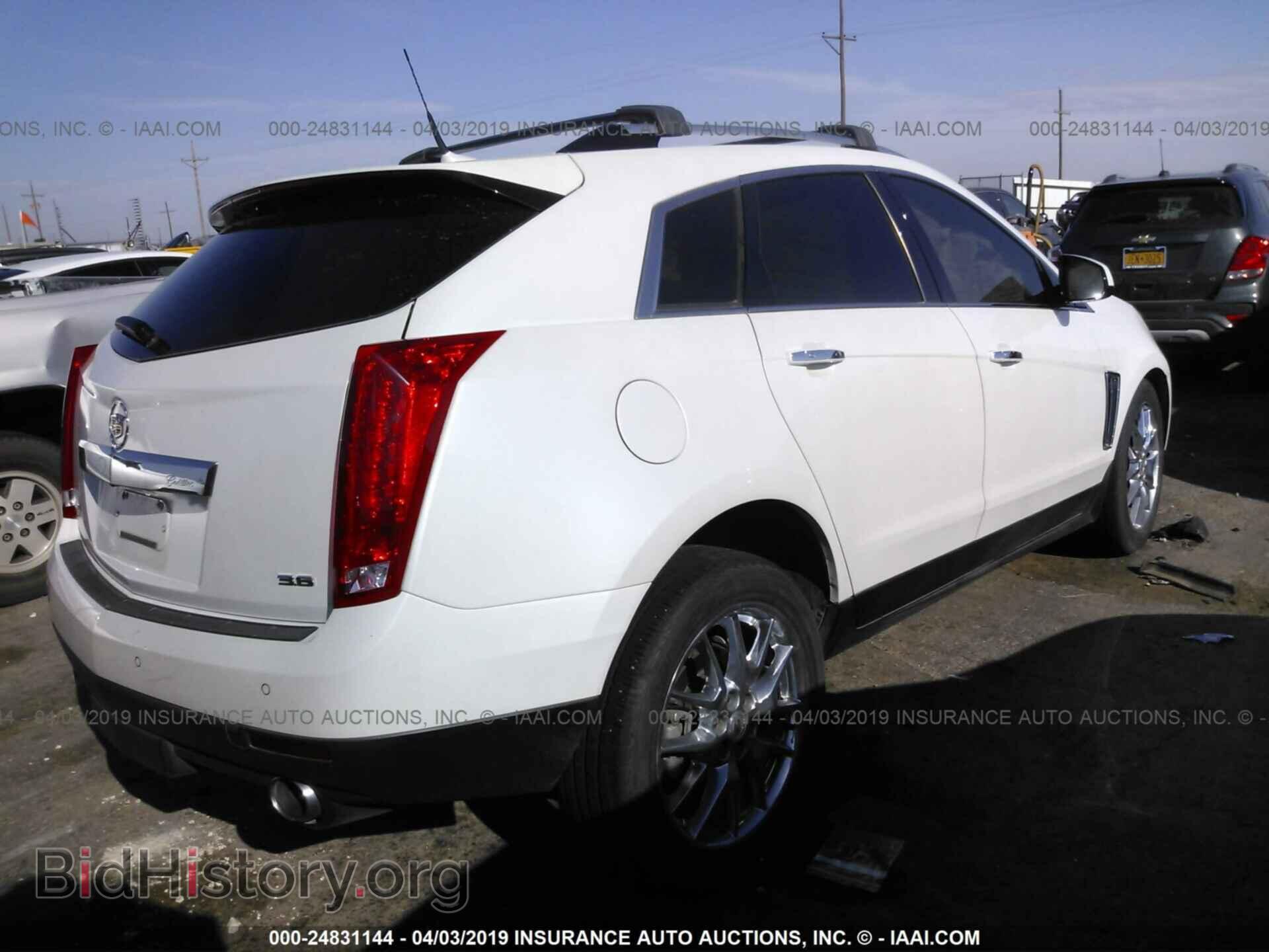 2013 CADILLAC SRX - VIN: 3GYFNDE31DS590269 - Фото 4