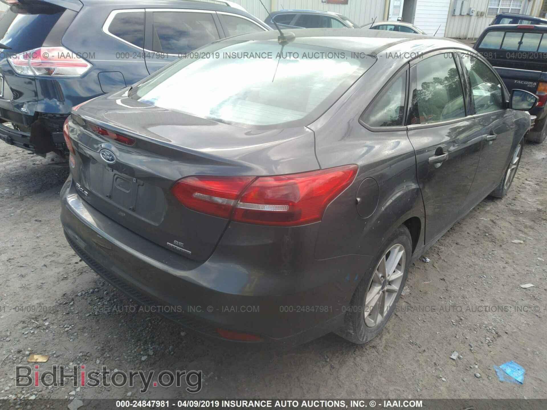 2016 FORD FOCUS - VIN: 1FADP3F2XGL370135 - Photo 4