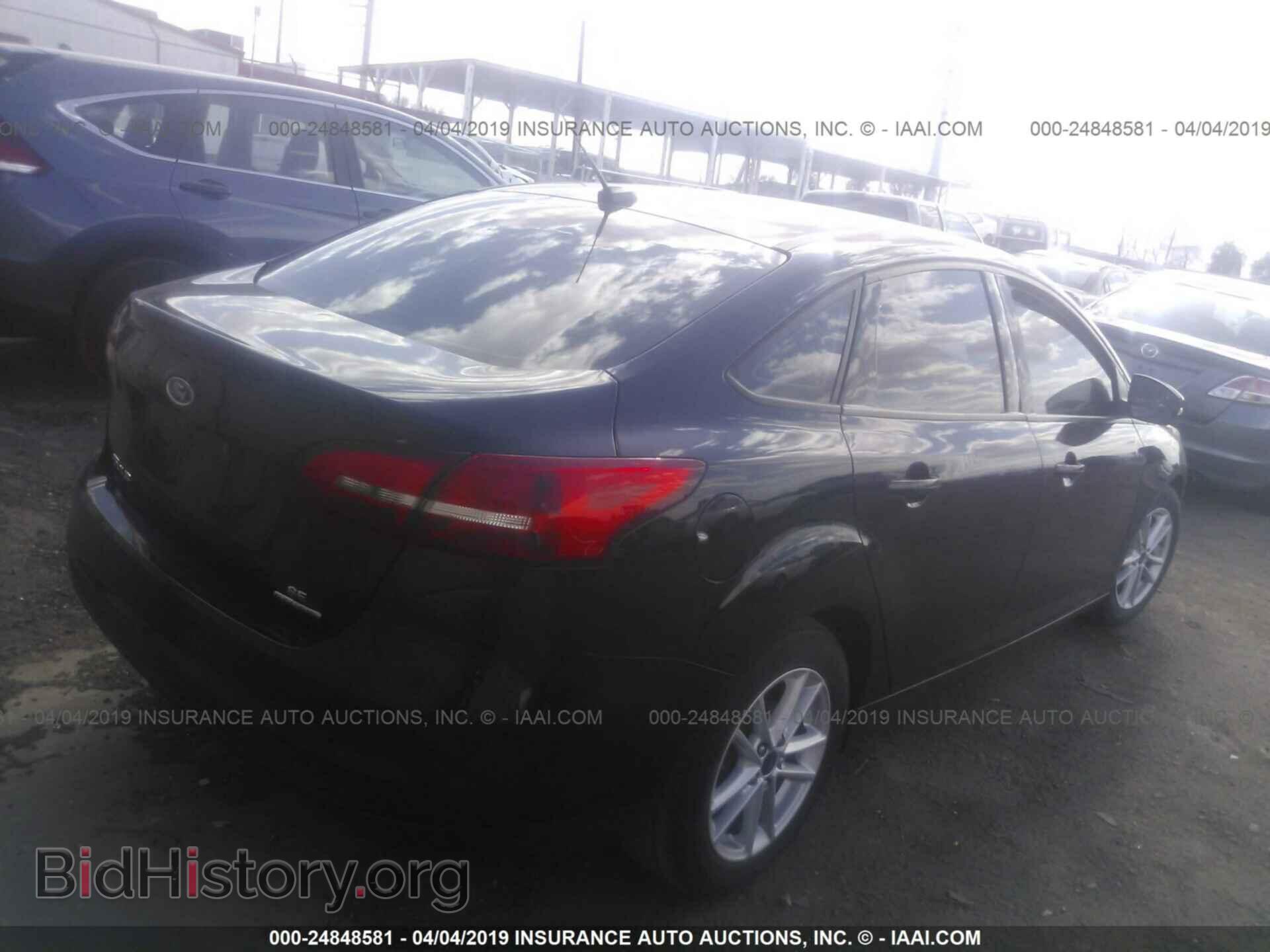 2016 FORD FOCUS - VIN: 1FADP3F2XGL310520 - Photo 4