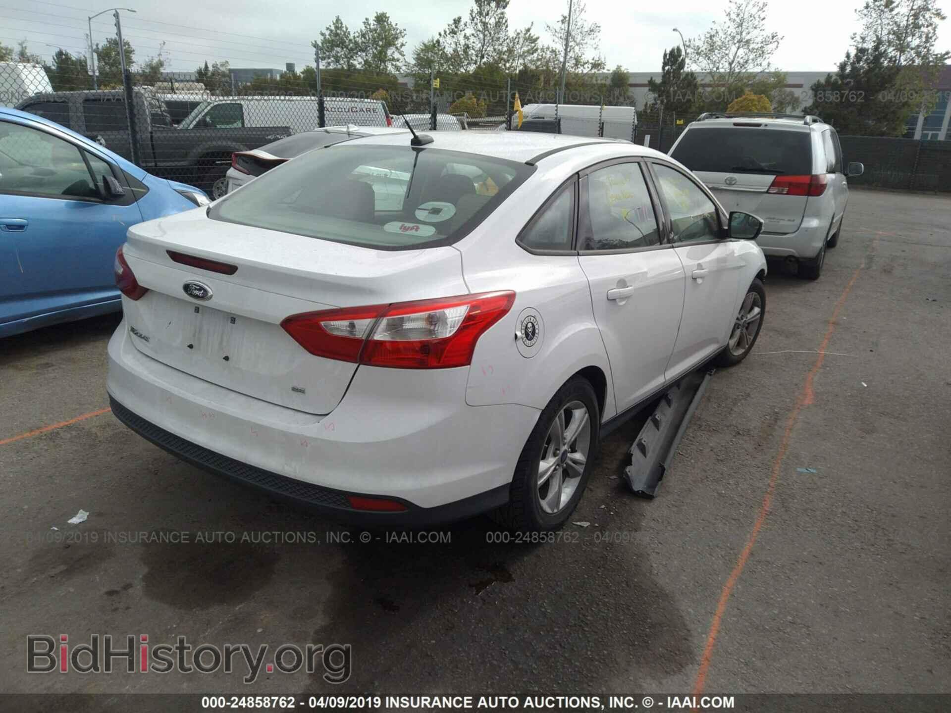2014 FORD FOCUS - VIN: 1FADP3F22EL442037 - Photo 4