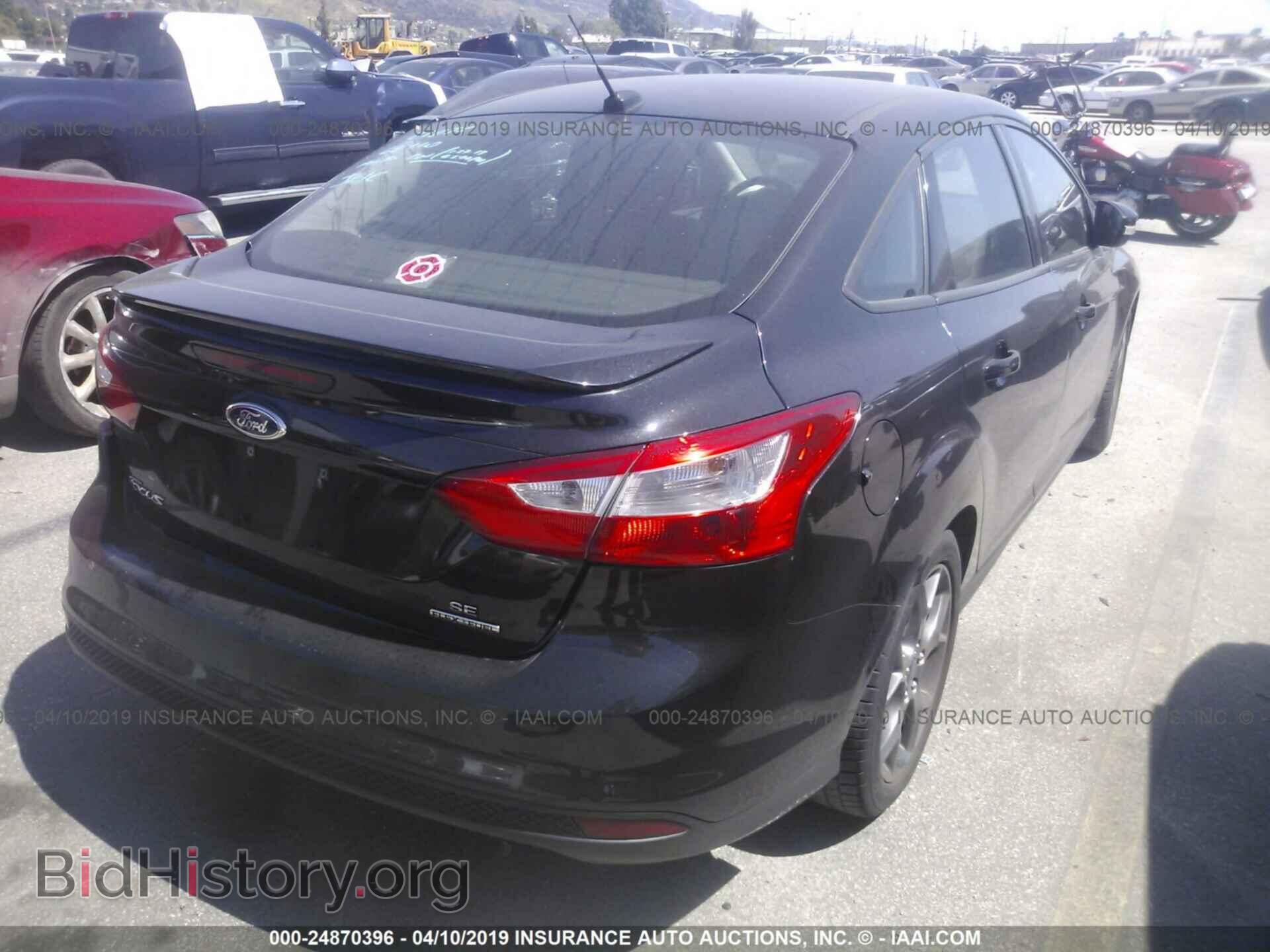 2014 FORD FOCUS - VIN: 1FADP3F29EL129454 - Photo 4
