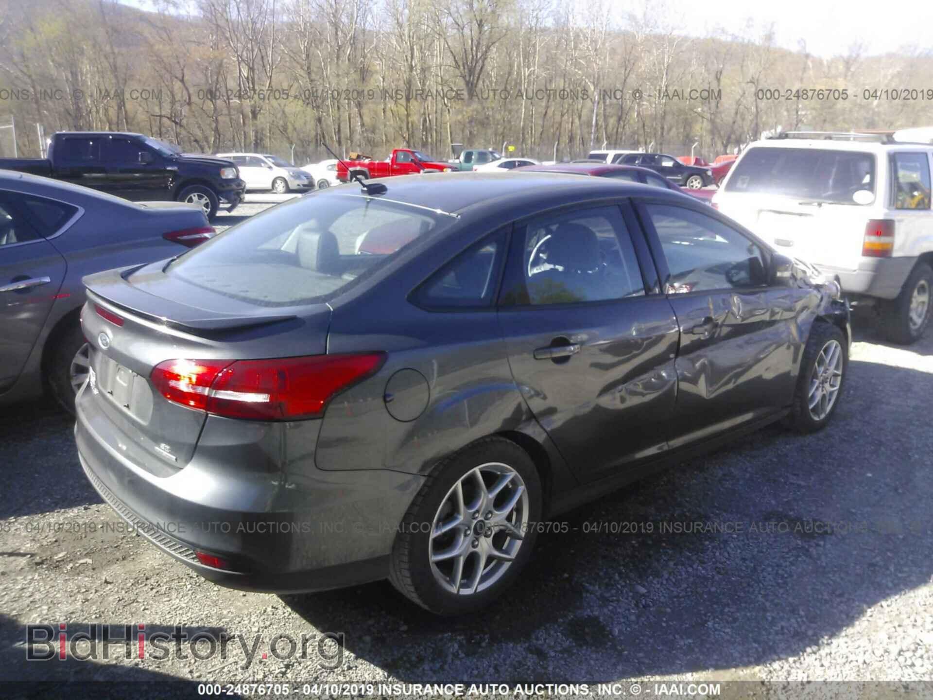 2015 FORD FOCUS - VIN: 1FADP3F20FL200767 - Photo 4