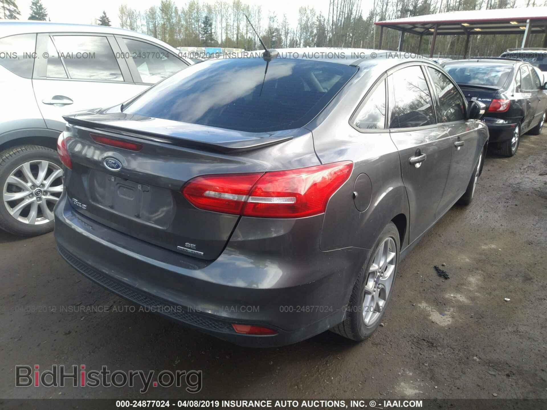 2015 FORD FOCUS - VIN: 1FADP3F27FL324664 - Photo 4