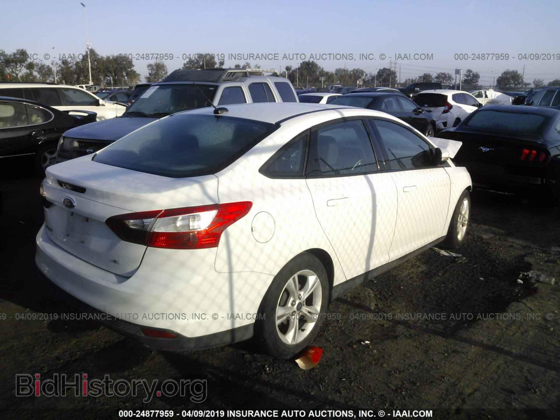 2014 FORD FOCUS - VIN: 1FADP3F25EL400946 - Photo 4