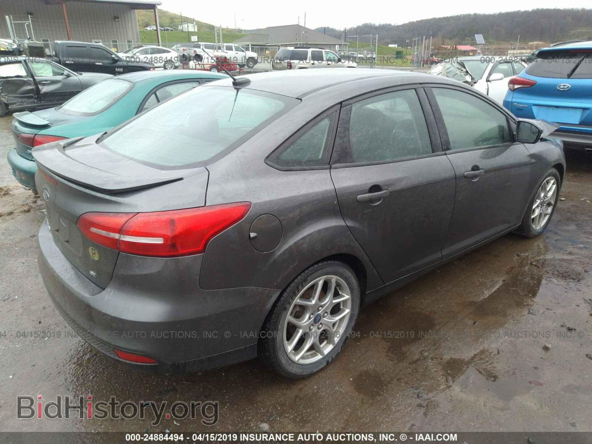 2015 FORD FOCUS - VIN: 1FADP3F21FL271282 - Photo 4