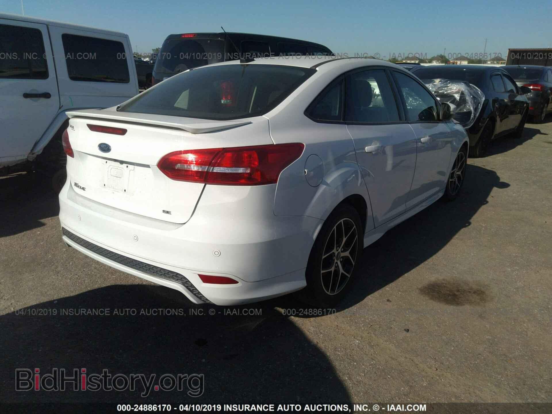 2016 FORD FOCUS - VIN: 1FADP3F2XGL374475 - Photo 4