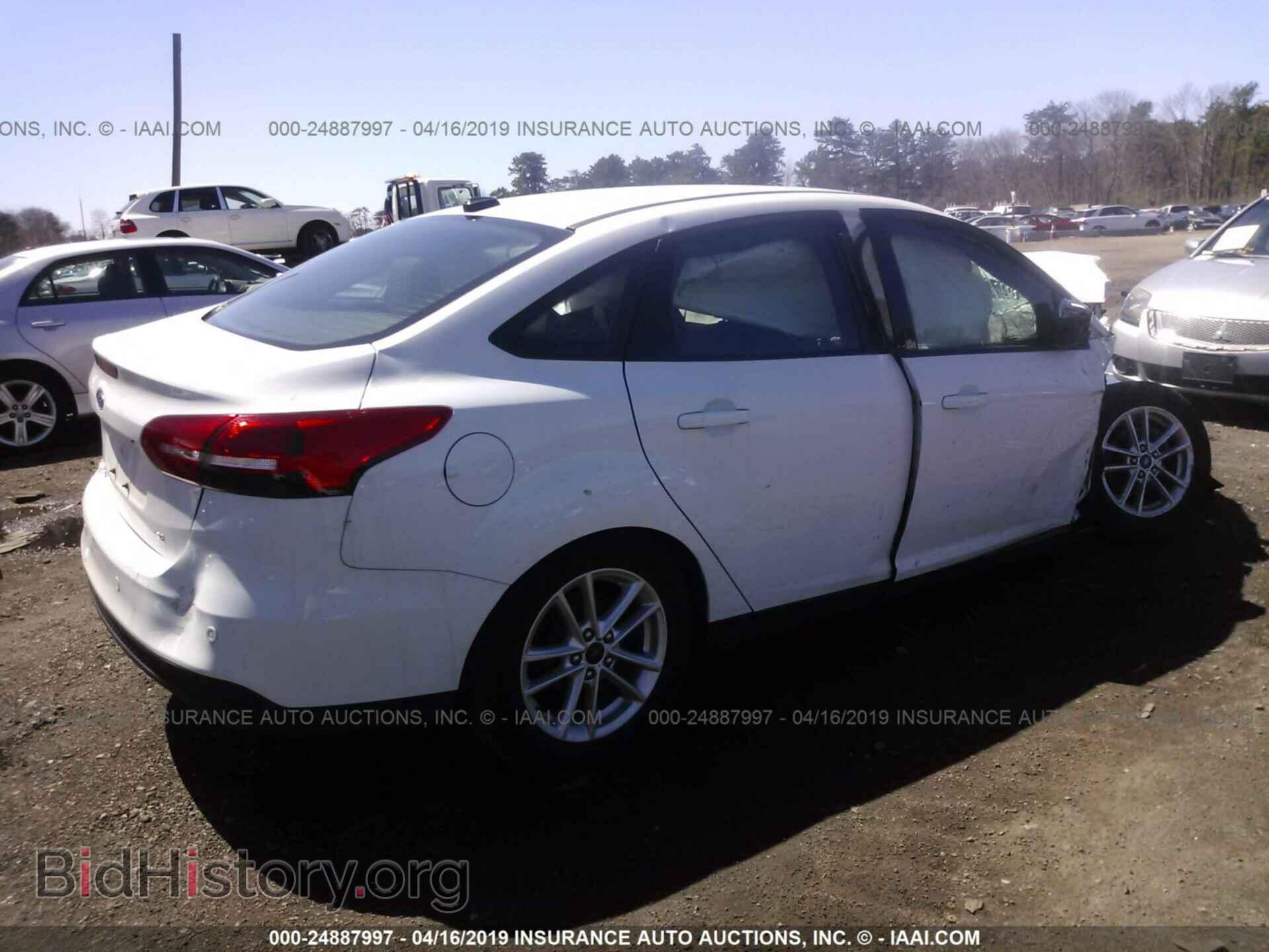 2016 FORD FOCUS - VIN: 1FADP3F25GL389109 - Photo 4