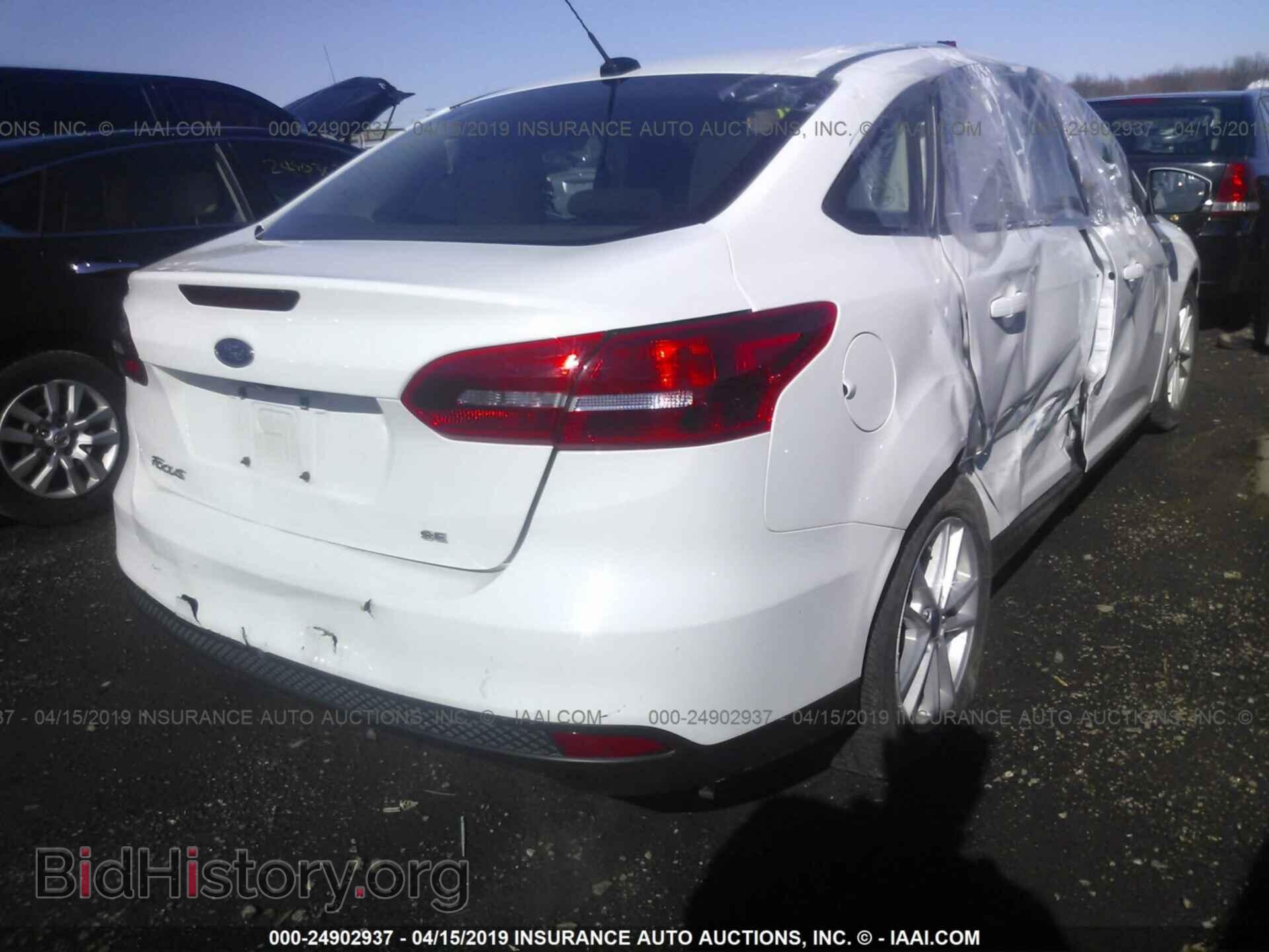 2017 FORD FOCUS - VIN: 1FADP3F2XHL237697 - Photo 4