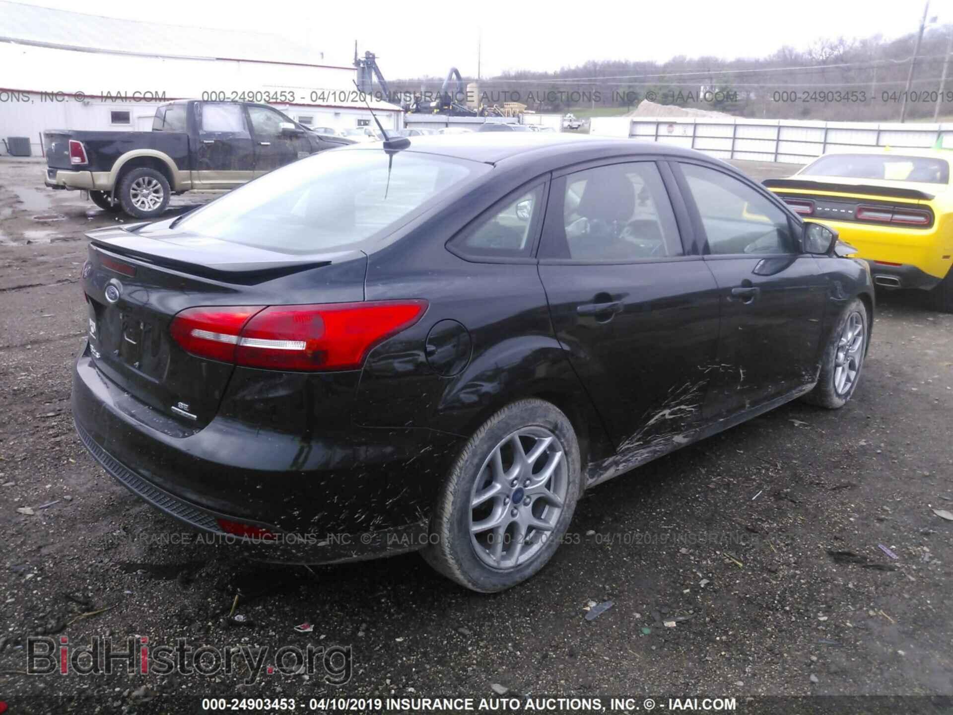 2015 FORD FOCUS - VIN: 1FADP3F22FL323292 - Photo 4