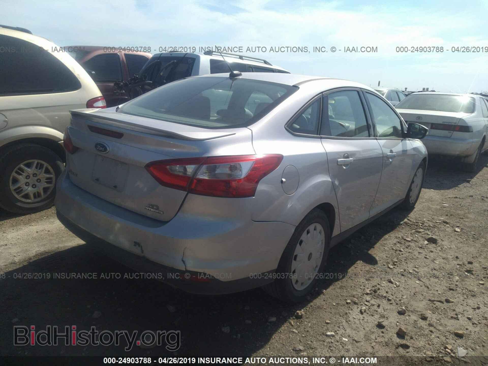 2014 Ford Focus - VIN: 1FADP3F29EL393984 - Фото 4