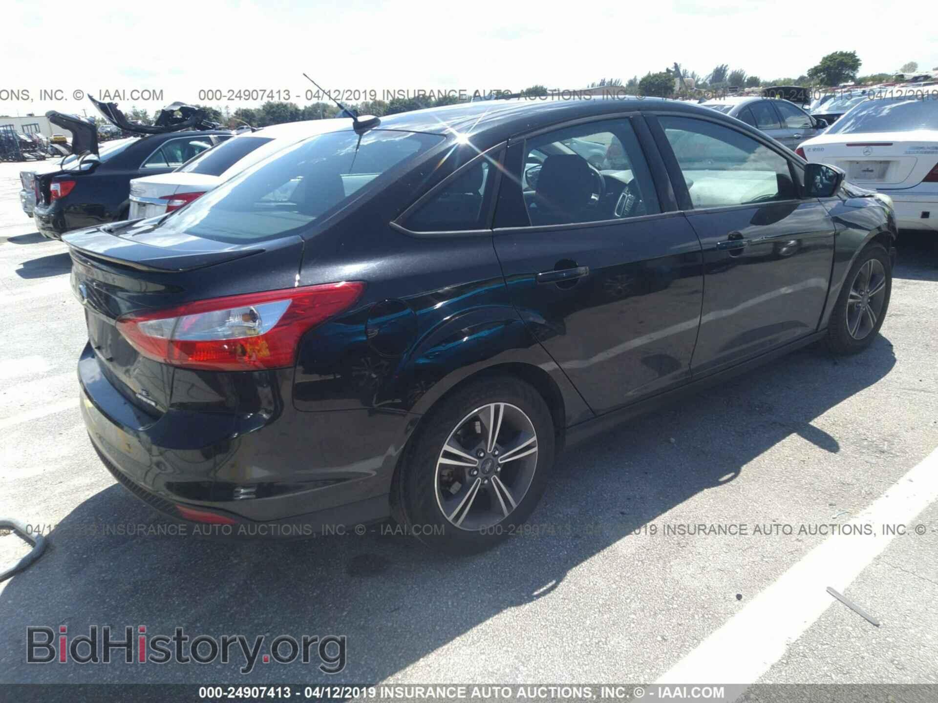 2014 FORD FOCUS - VIN: 1FADP3F22EL403335 - Photo 4
